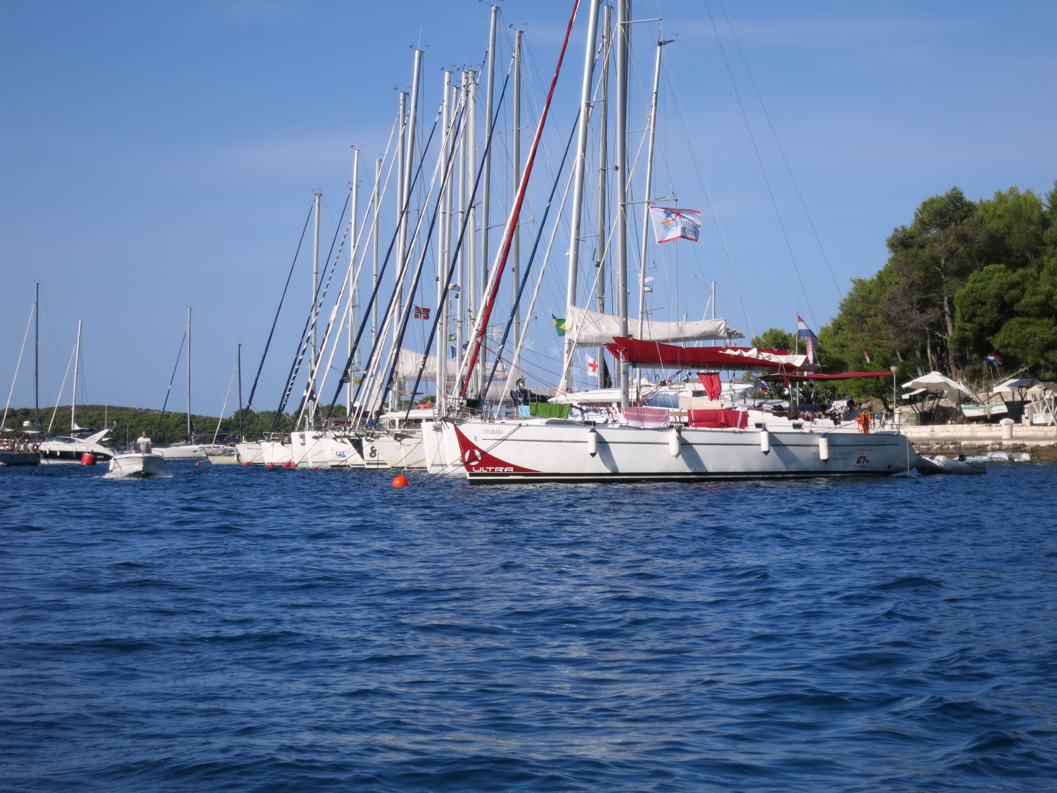 Maritime traffic near Hvar buoy field with swells