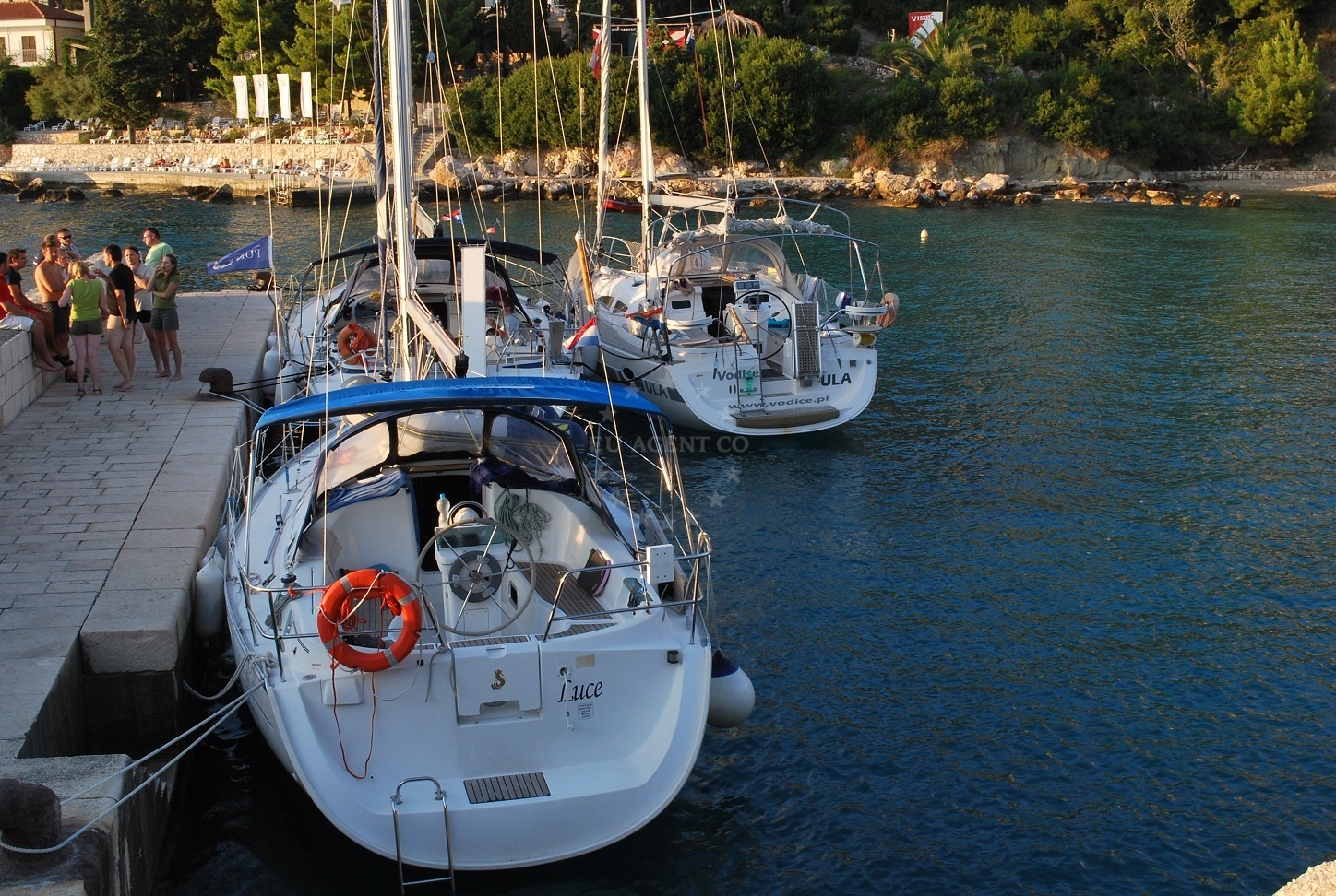 Yachts mooring at Hvar Jetty, Central Dalmatia, Croatia with nearby quay