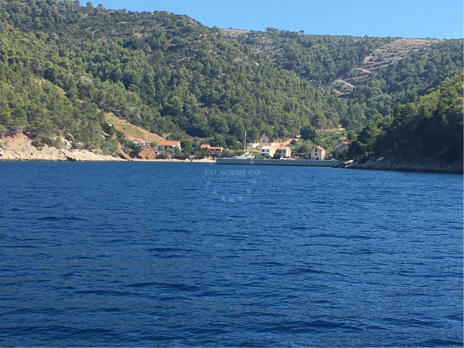 Hvar Jetty with deep northern waters and view of Stiniva Beach