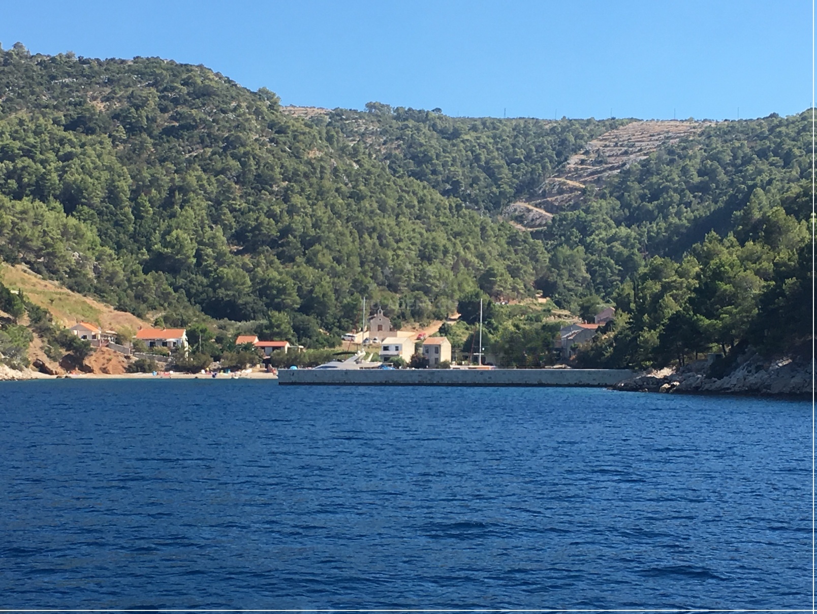 Jetty structure with boats docked at Hvar, Croatia