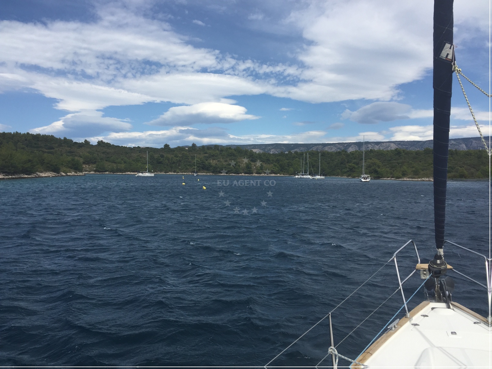 Calm bay of Luka Tiha with clear waters and buoy fields