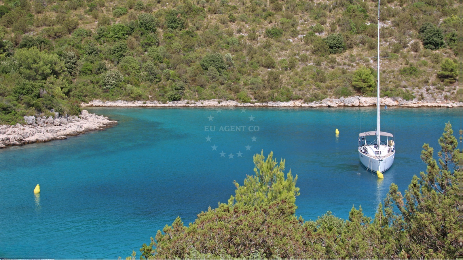 Sailboat anchoring near Stari Grad A Malo Stupisce buoy field