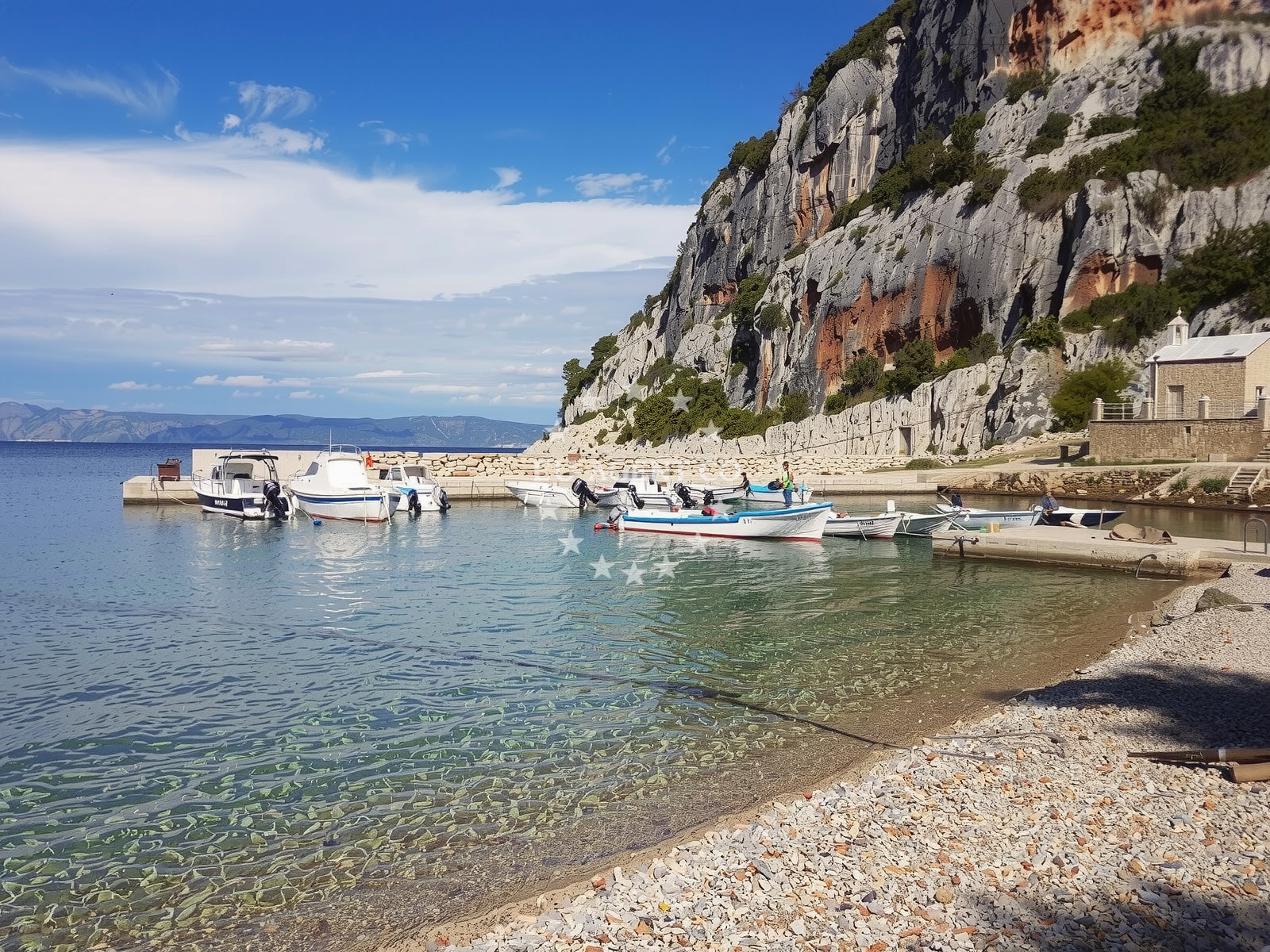 Jetty in Velika Stiniva with view of Vela Stiniva Bay