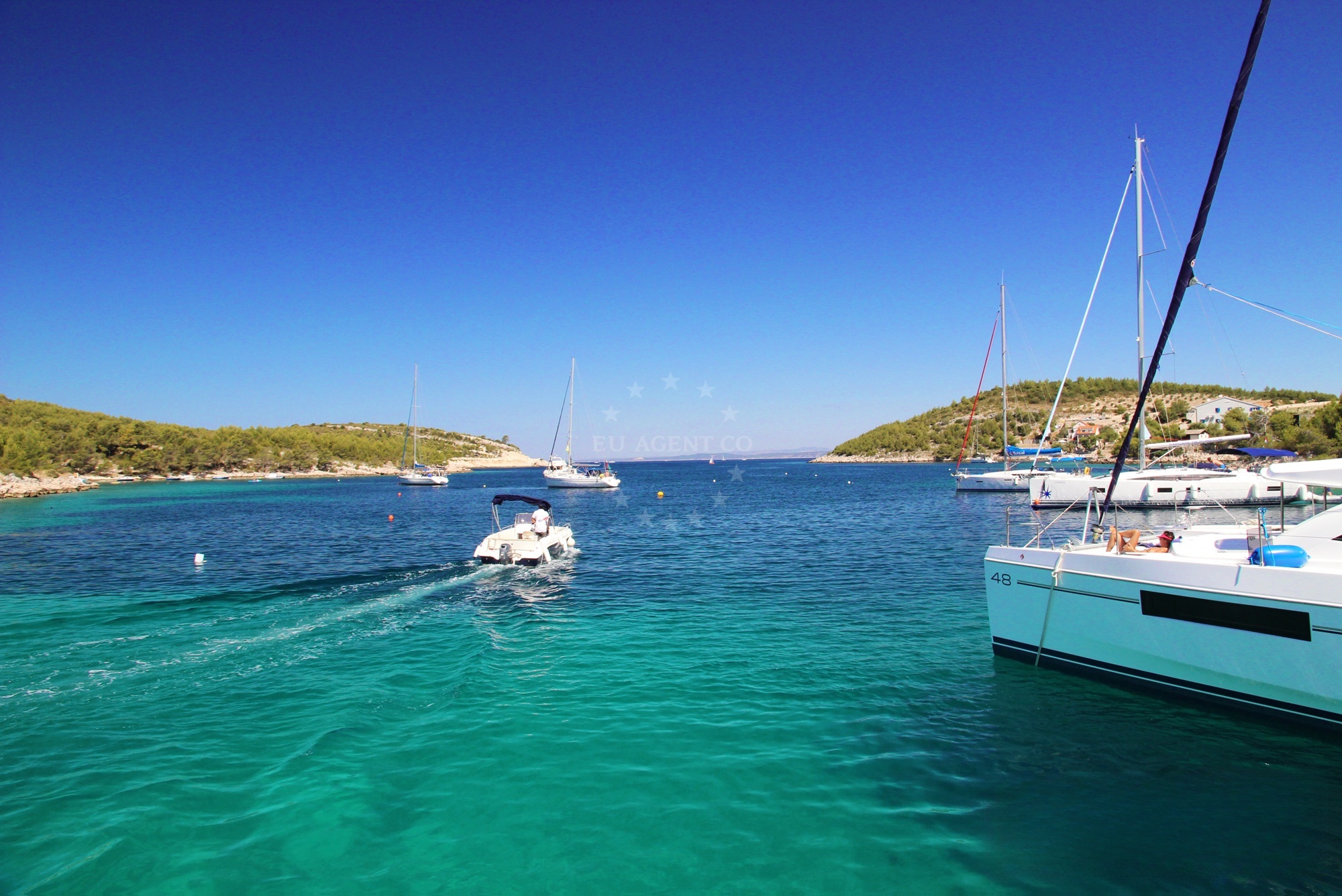Sailboats moored at Konoba Arsenol Buoy Field in Vira, Hvar