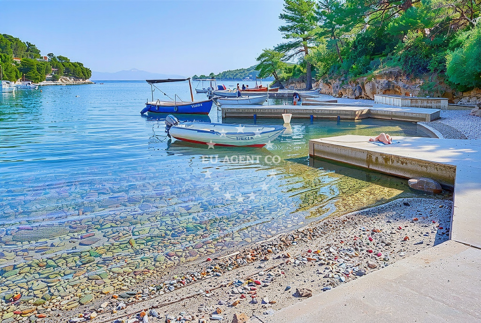Jetty in Vrbanj, Hvar, Croatia, with boats moored nearby