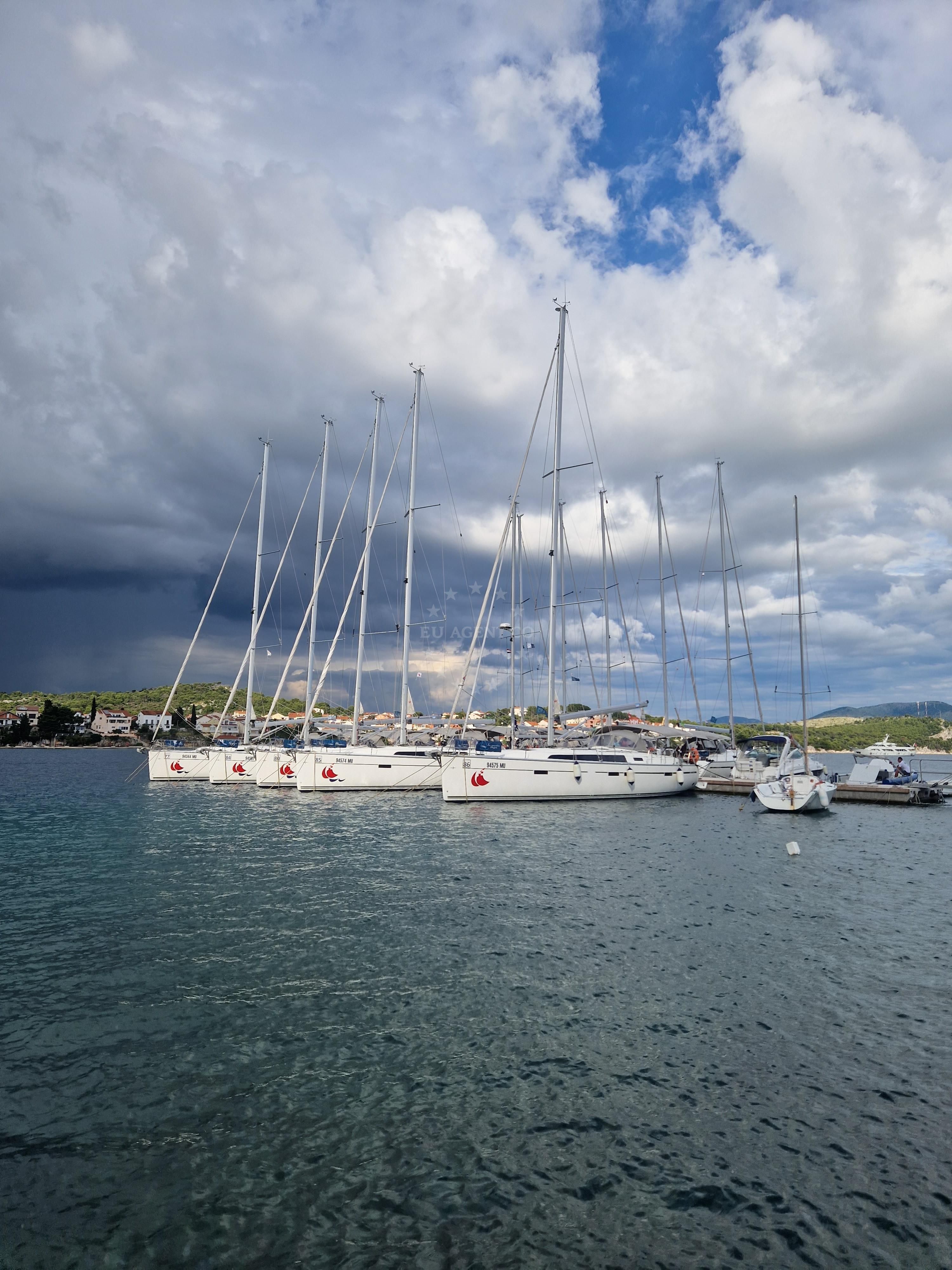 Yachts moored at Hotel Spongiola Jetty in Krapanj, Central Dalmatia