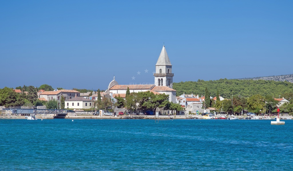 Buoy field in Osor, Cres, Croatia with the Adria restaurant in the background