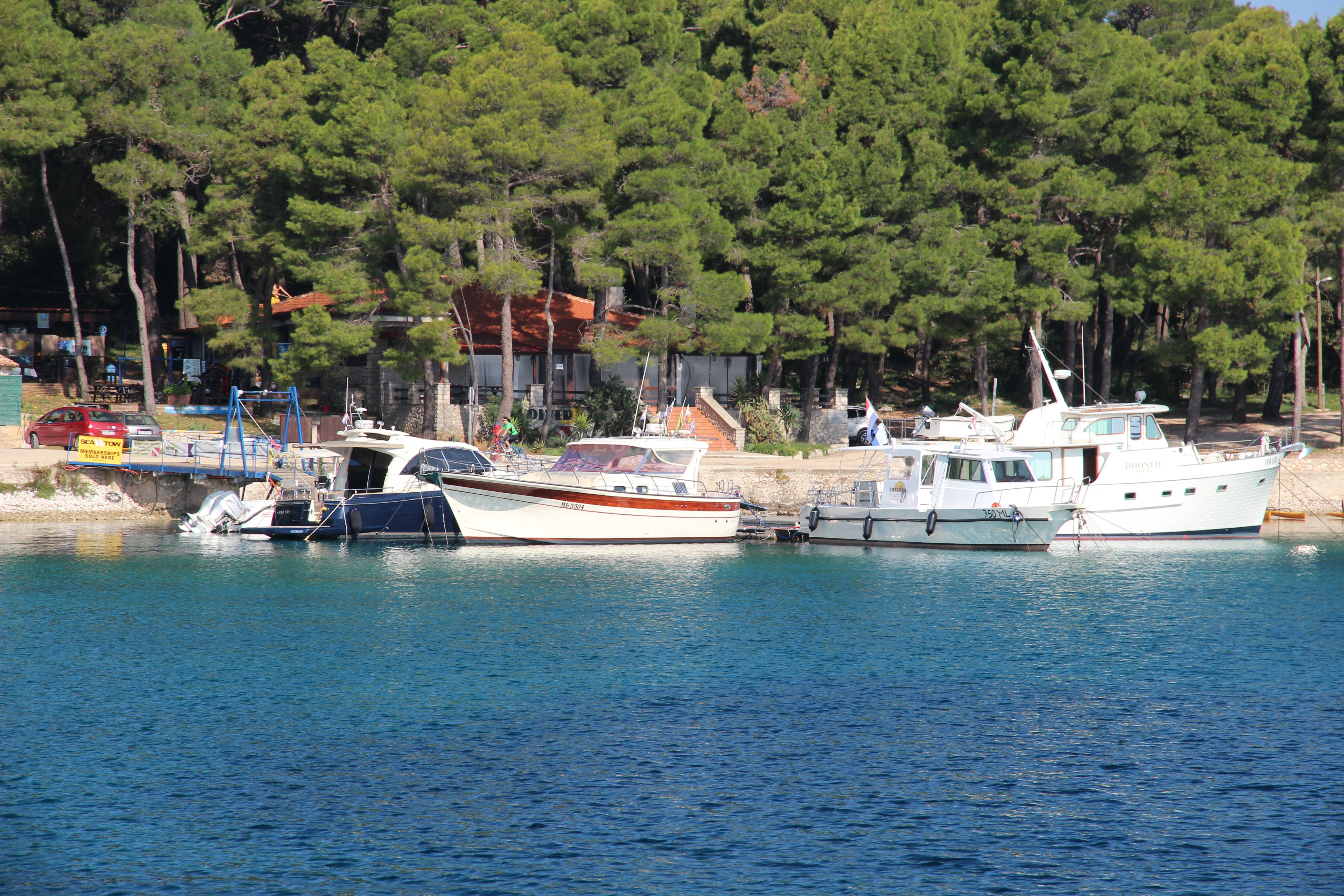 Mali Losinj jetty with mooring lines and diving center access
