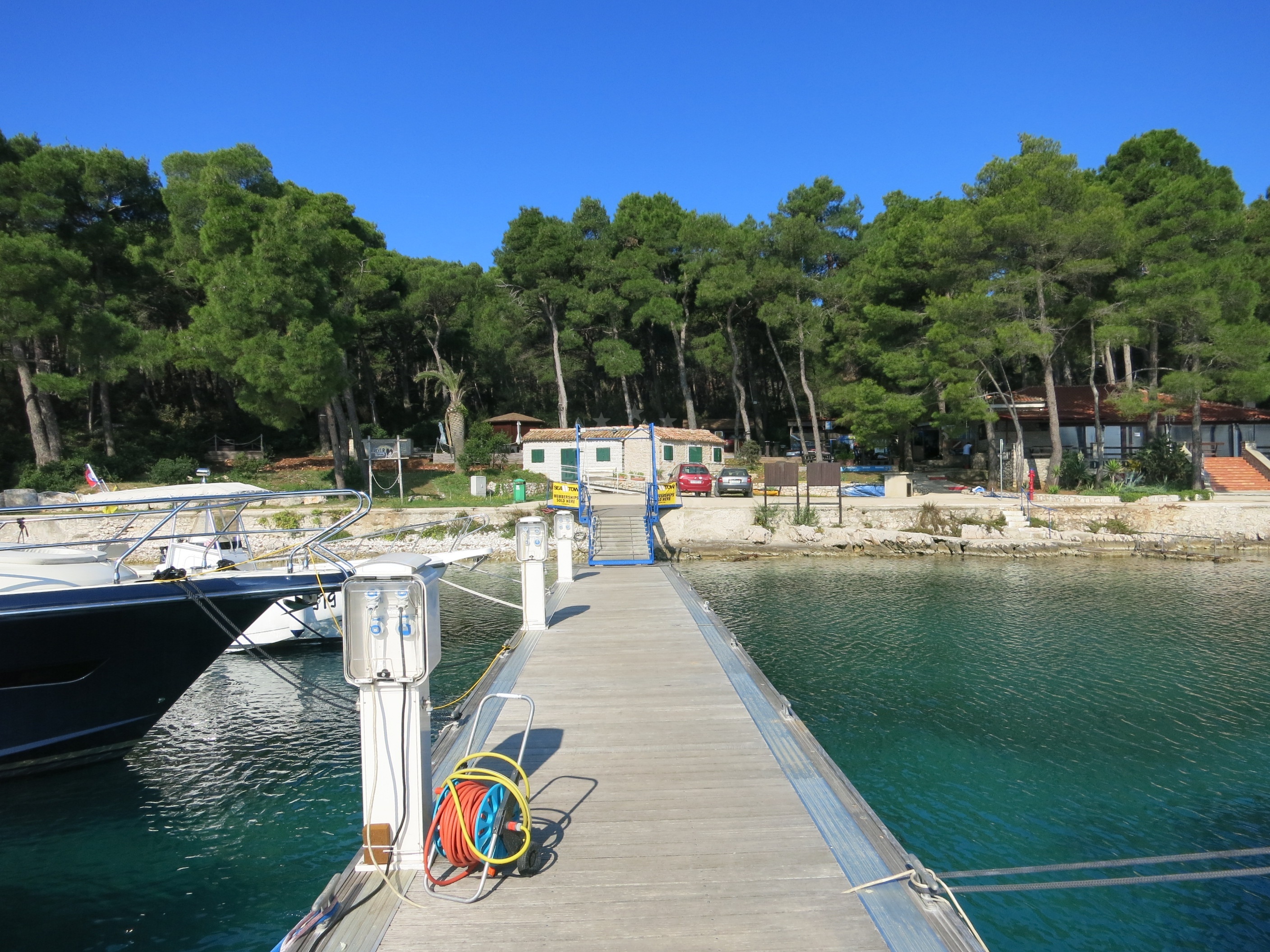 Jetty in Mali Losinj, part of a diving center with nearby boats