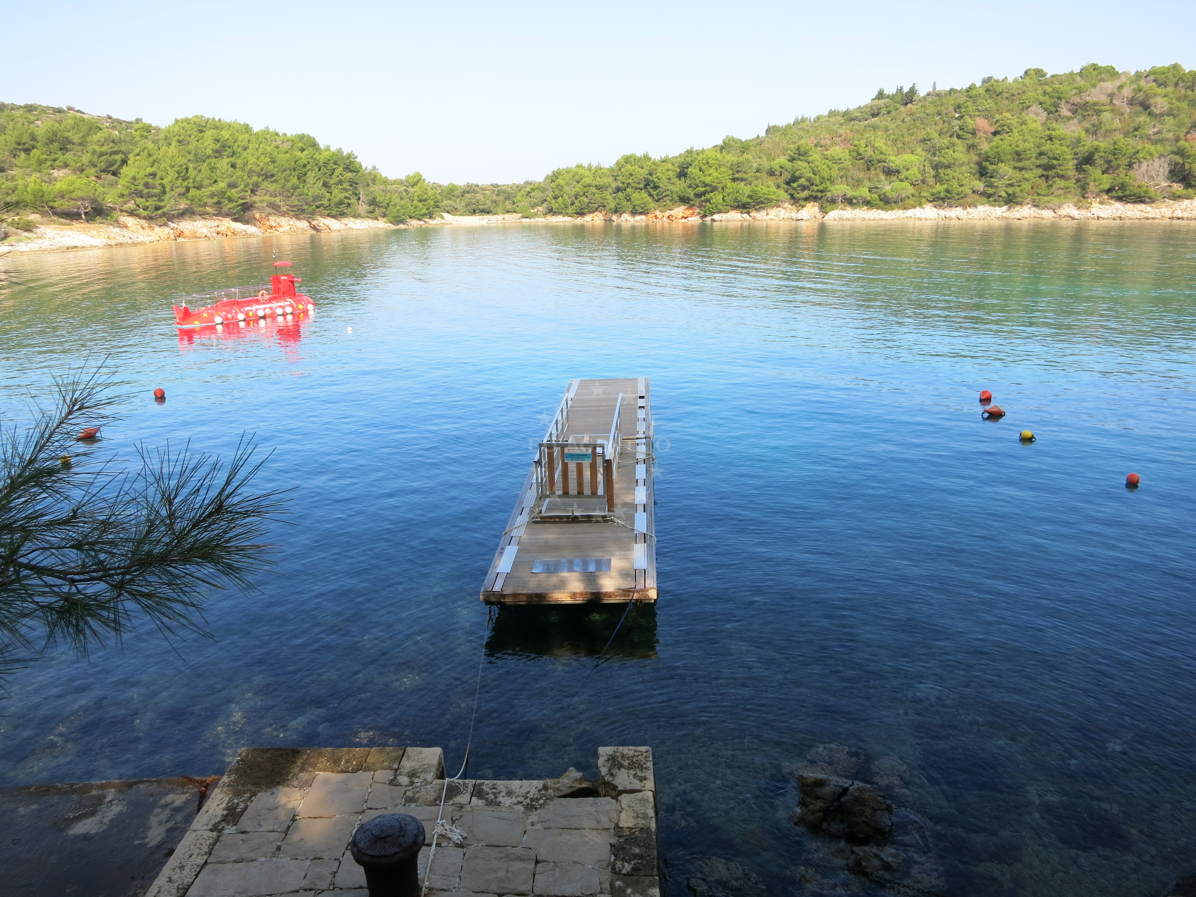 Luka Valdarke jetty in Mali Losinj, Croatia with mooring buoy