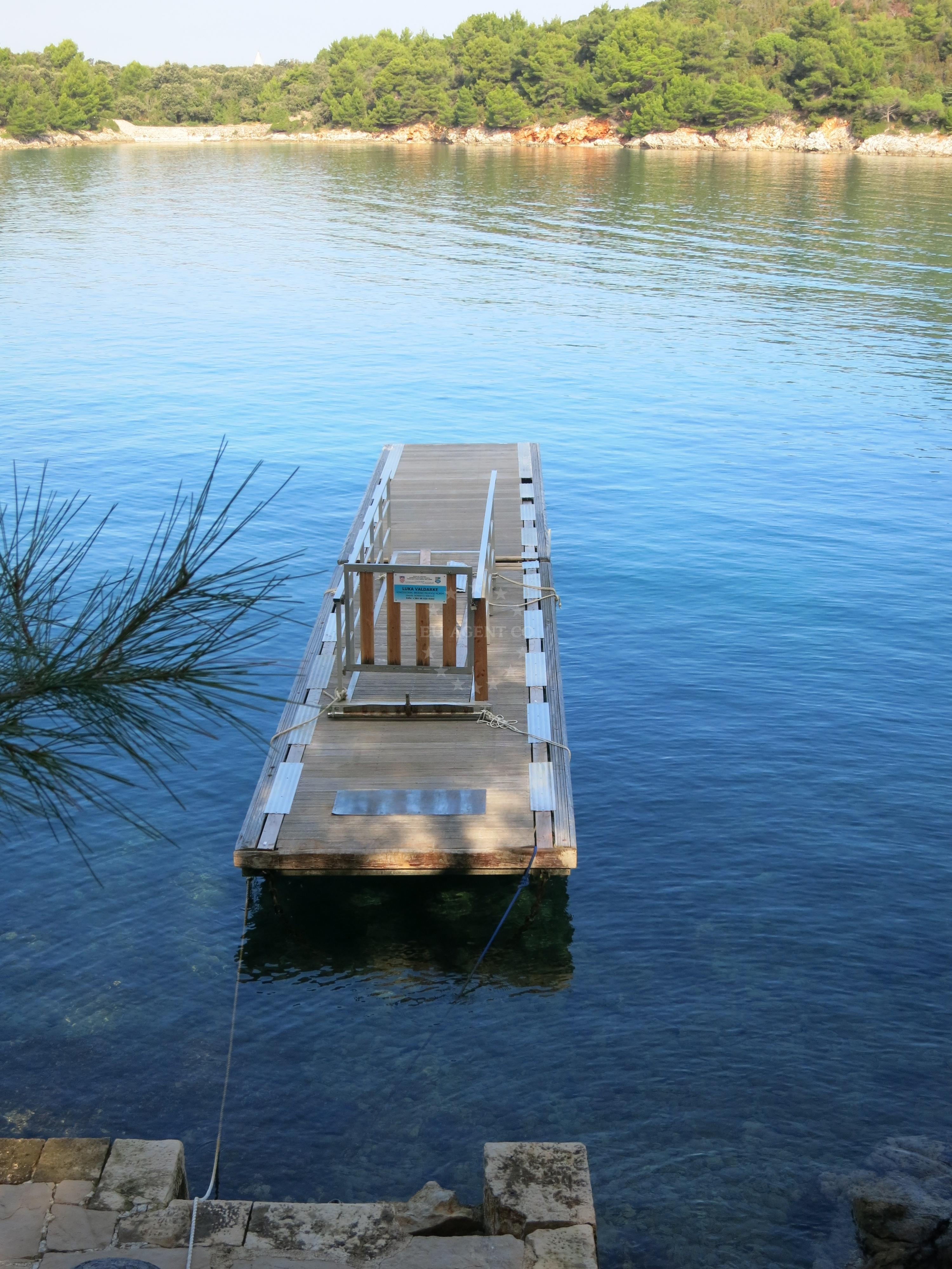 View of Luka Valdarke jetty and surrounding Adriatic Sea