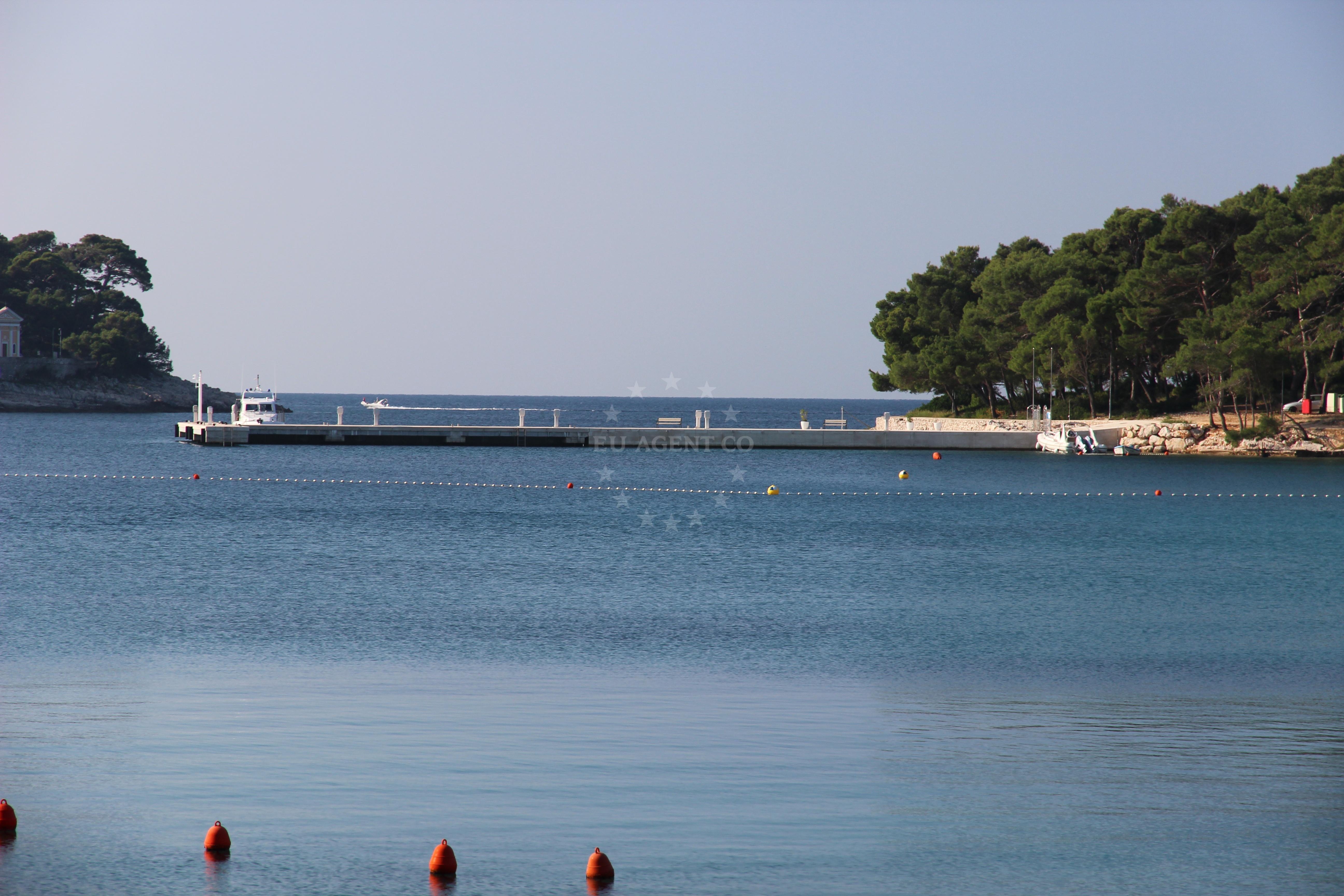 Marina Cikat jetty with Adriatic Sea backdrop