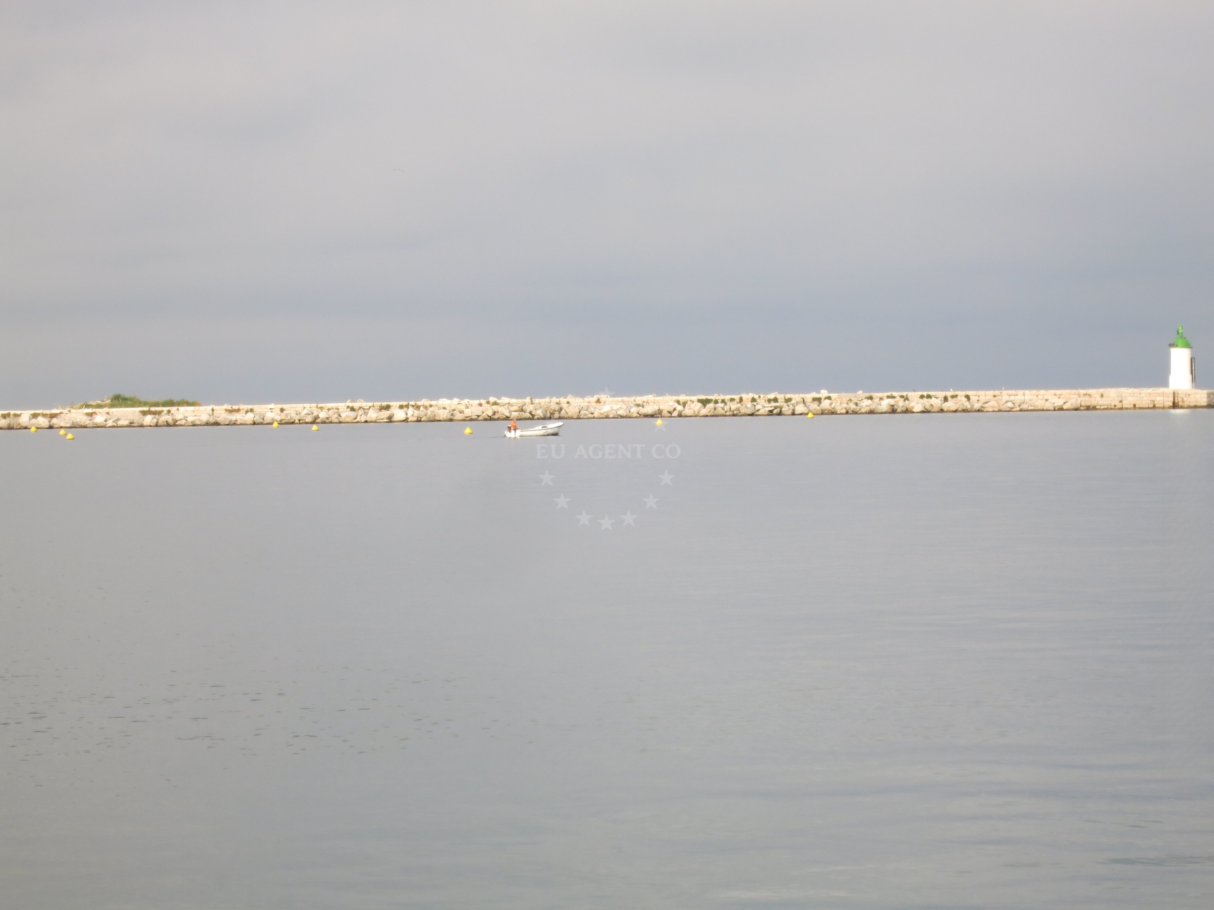 Buoy field in Poreč, Istria and Kvarner, Croatia with yachts moored near the northern breakwater