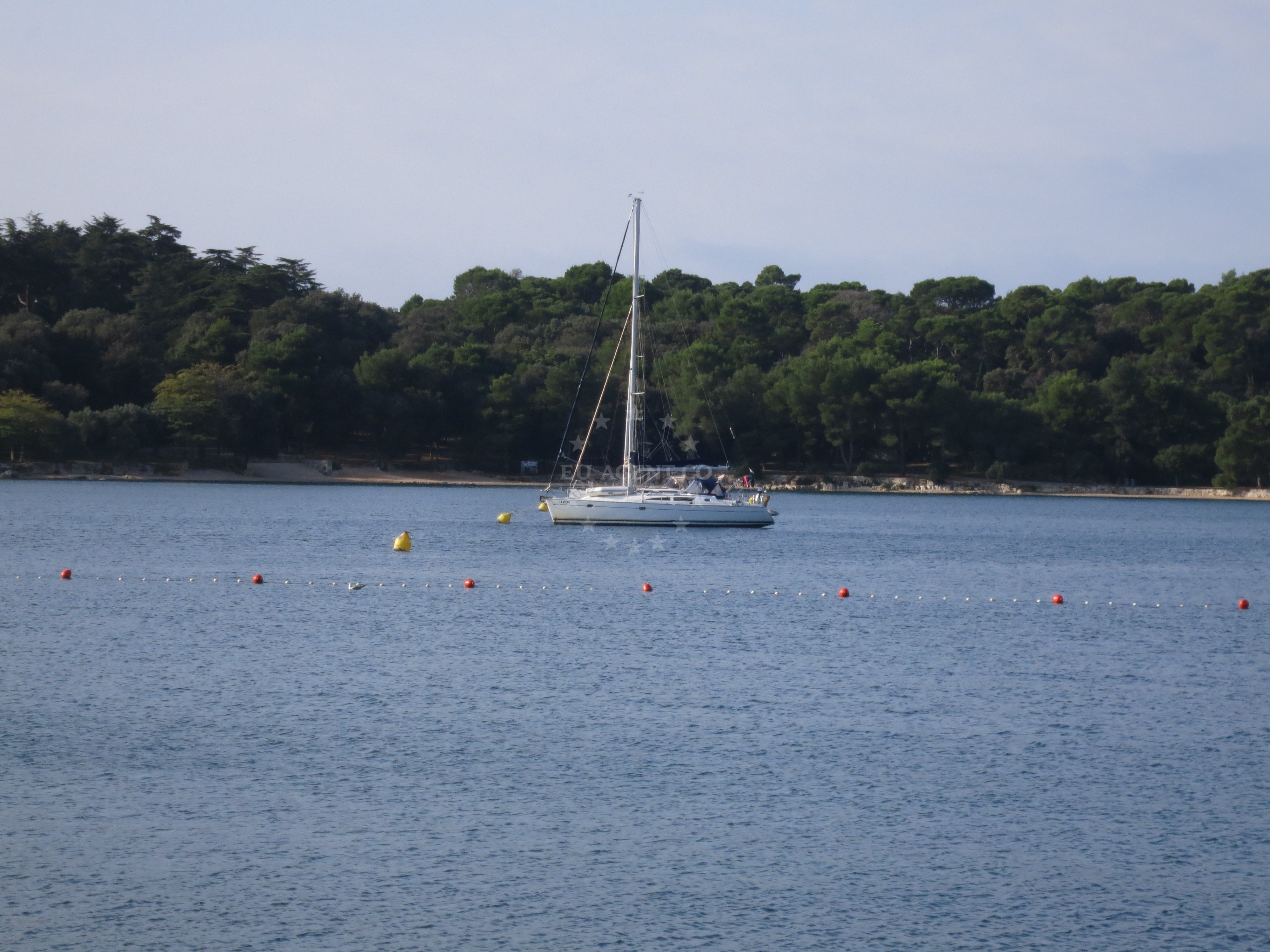 Nautical view of Rovinj buoy field with Adriatic Sea in the background