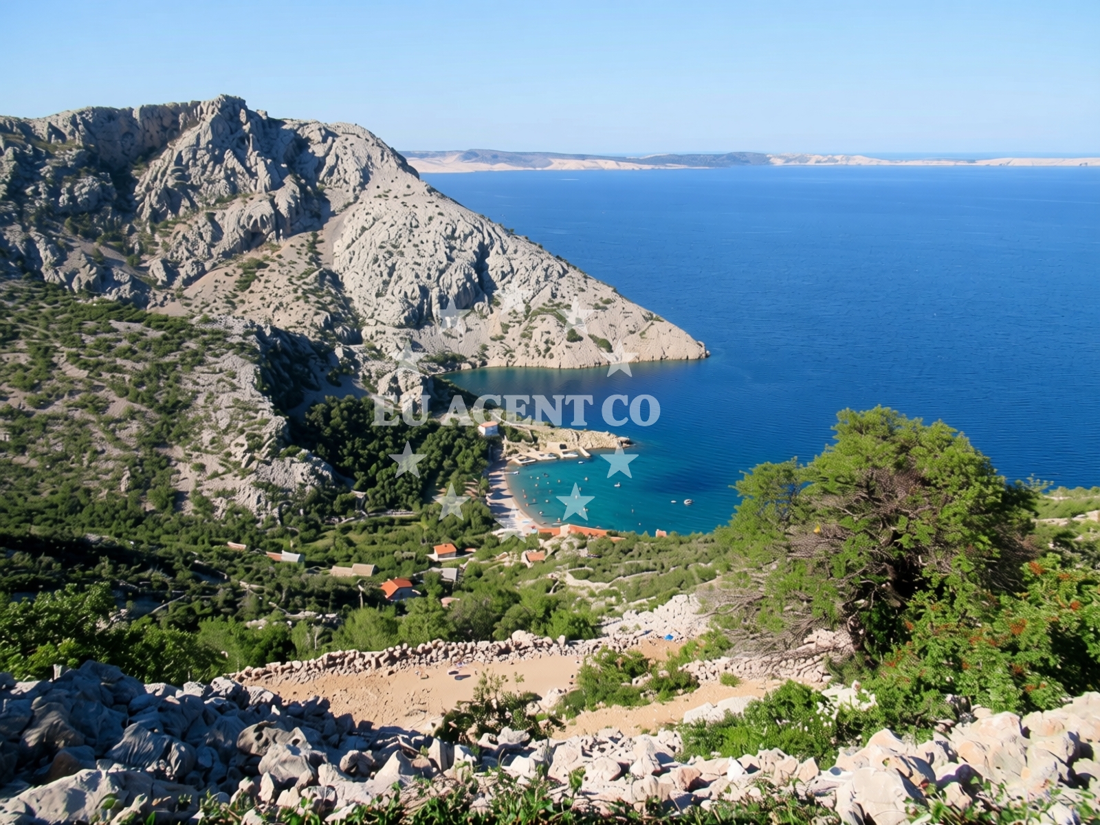 Shallow waters near Veli Vranjak Quay with a small vessel docking