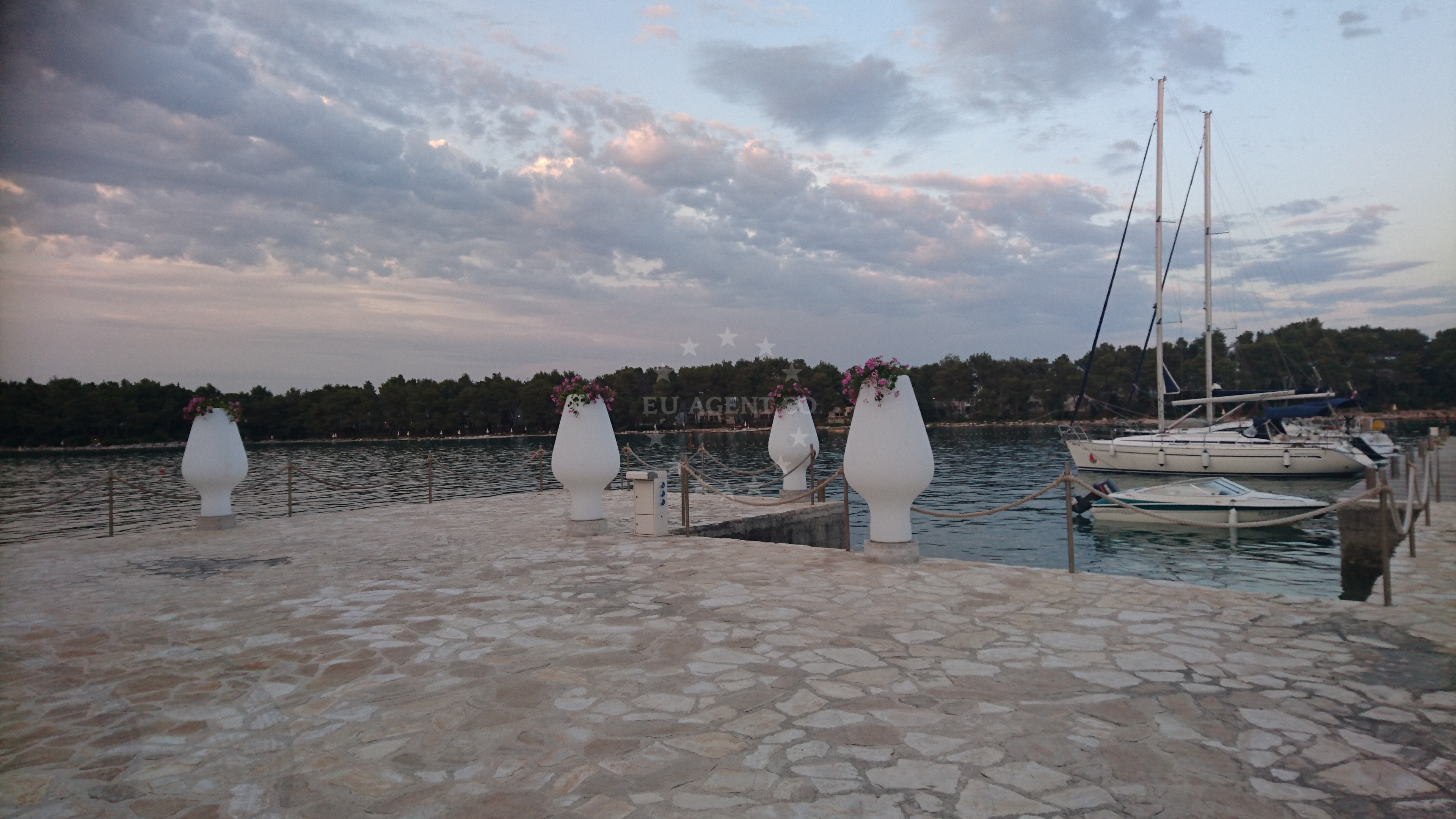 Crvena Luka Jetty with nearby beach and hotel facilities