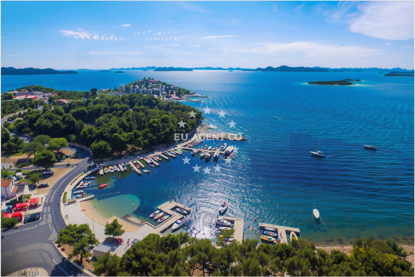 Jetty in Drage, North Dalmatia, Croatia with boats moored nearby