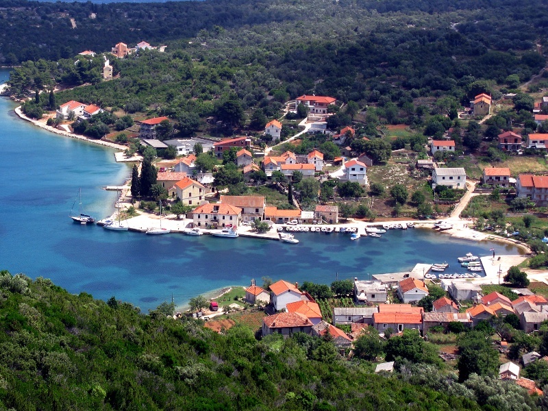 Luka Quay on Dugi Otok, Croatia with mooring berths and calm waters