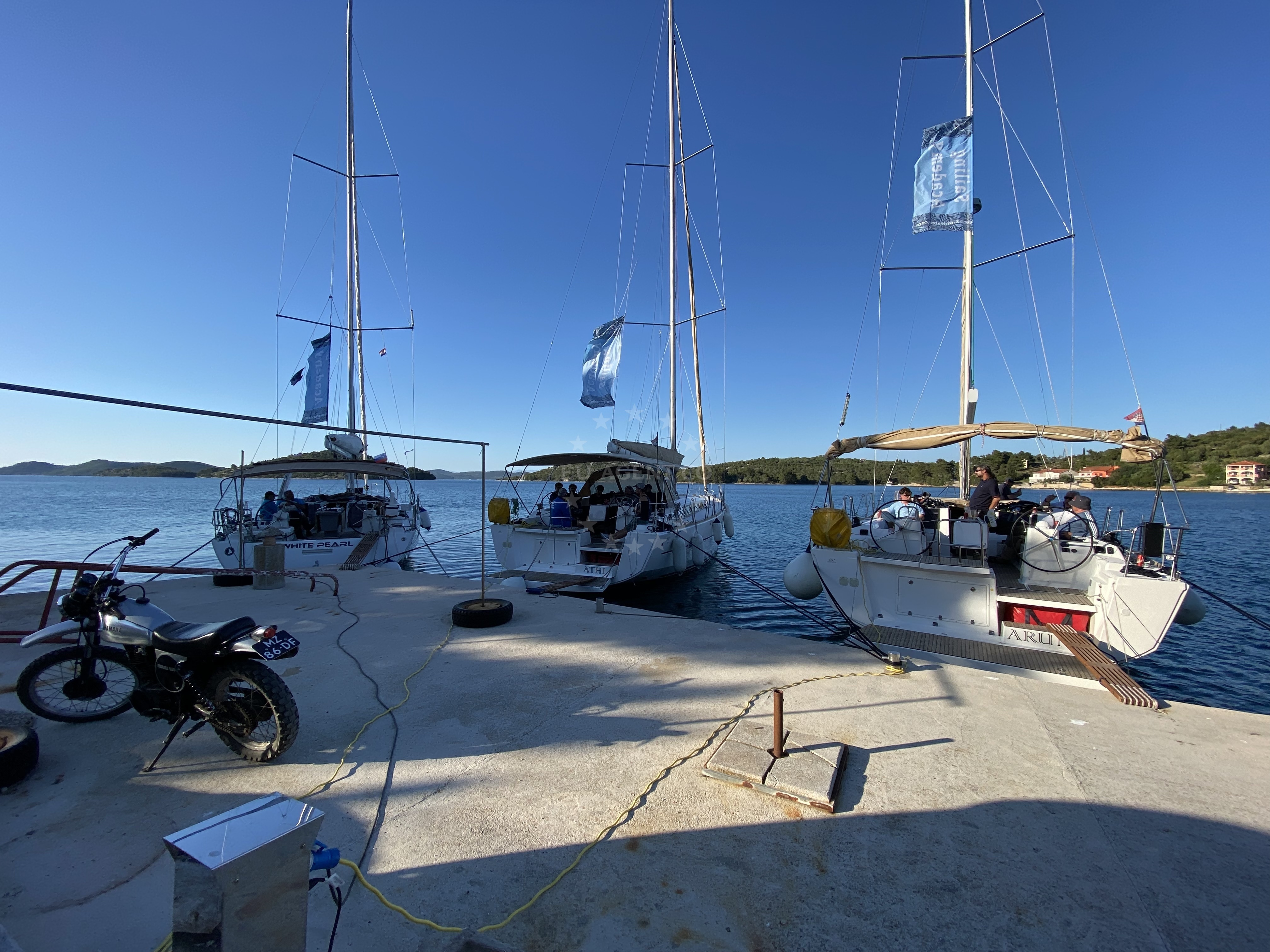 Quay in Luka, Dugi Otok with mooring lines and nearby Alen restaurant