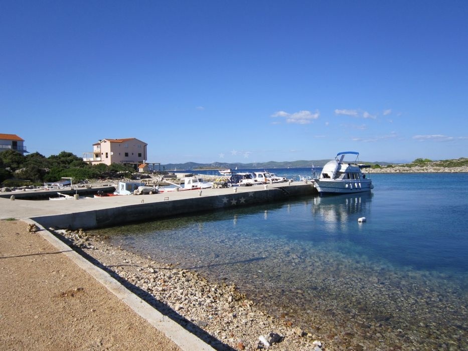 Two-story Konoba Antonio restaurant overlooking the sea on Kaprije Island, Croatia