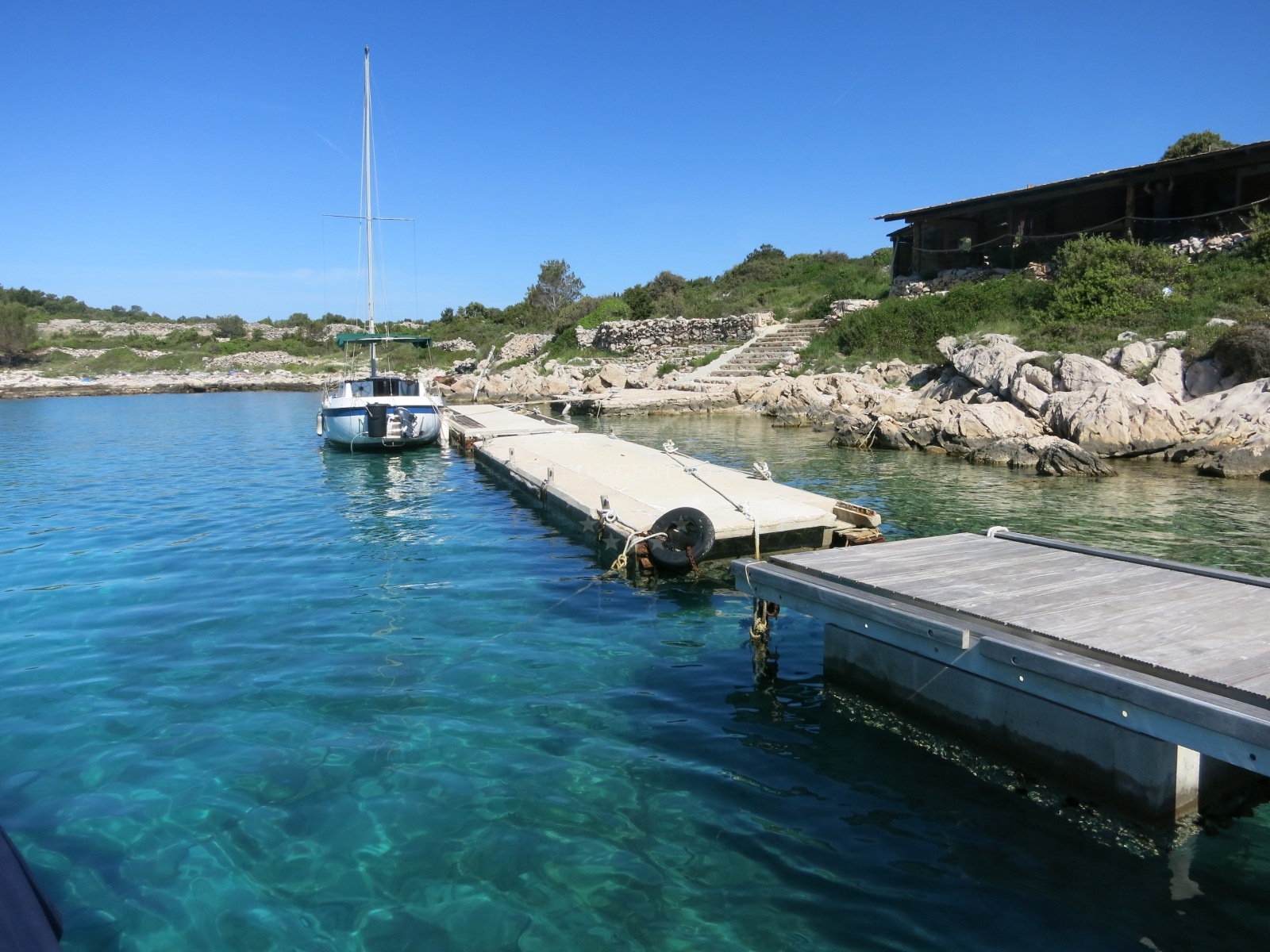 Yachts moored at Konoba Kunjka Jetty, North Dalmatia, Croatia