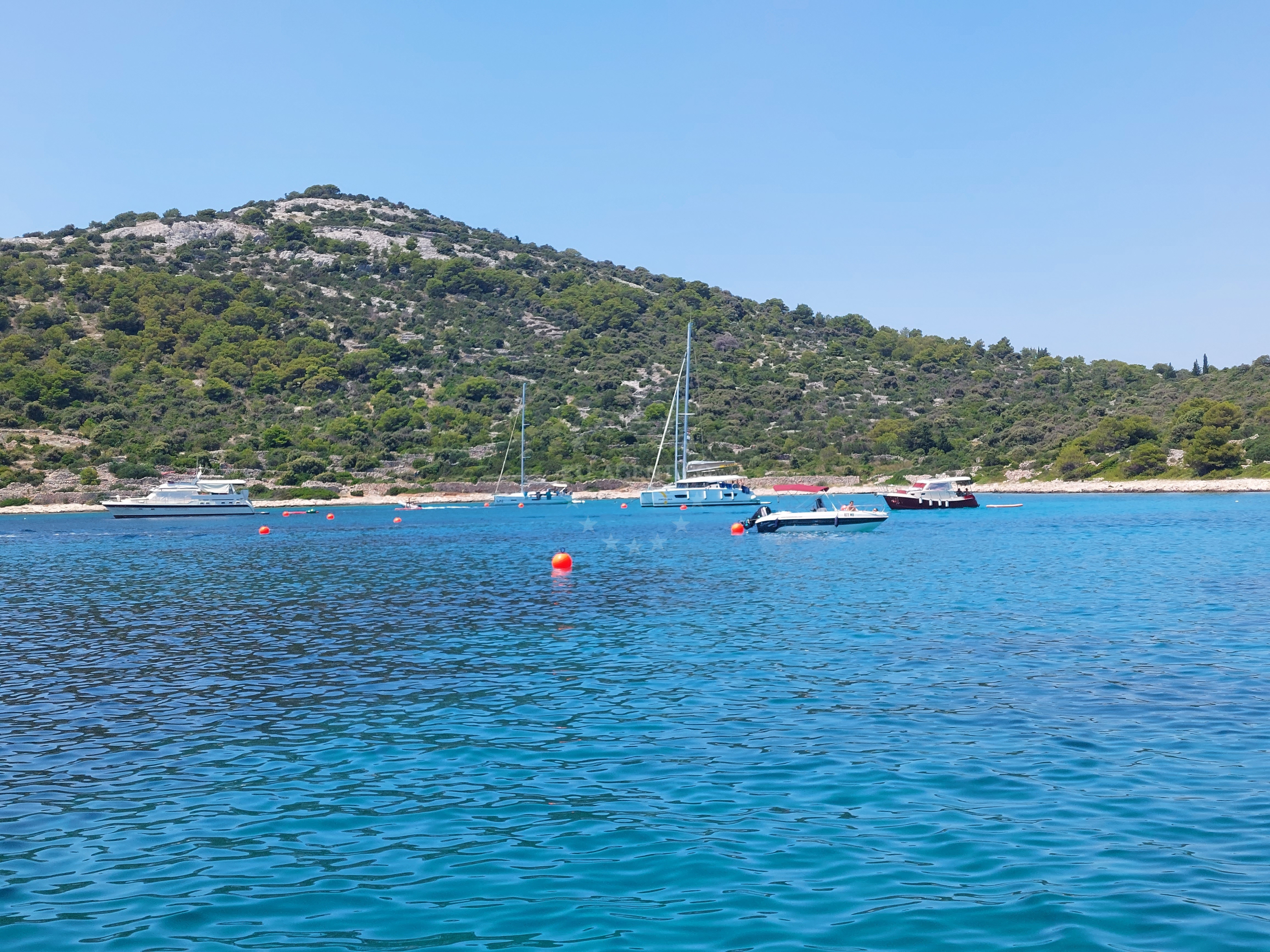 Nautical view of Nozdra Vela buoy field with nearby beaches and restaurants