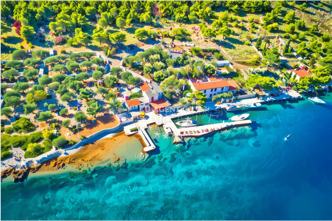 Jetty on Katina Island, North Dalmatia, Croatia with mooring lines and nearby boats