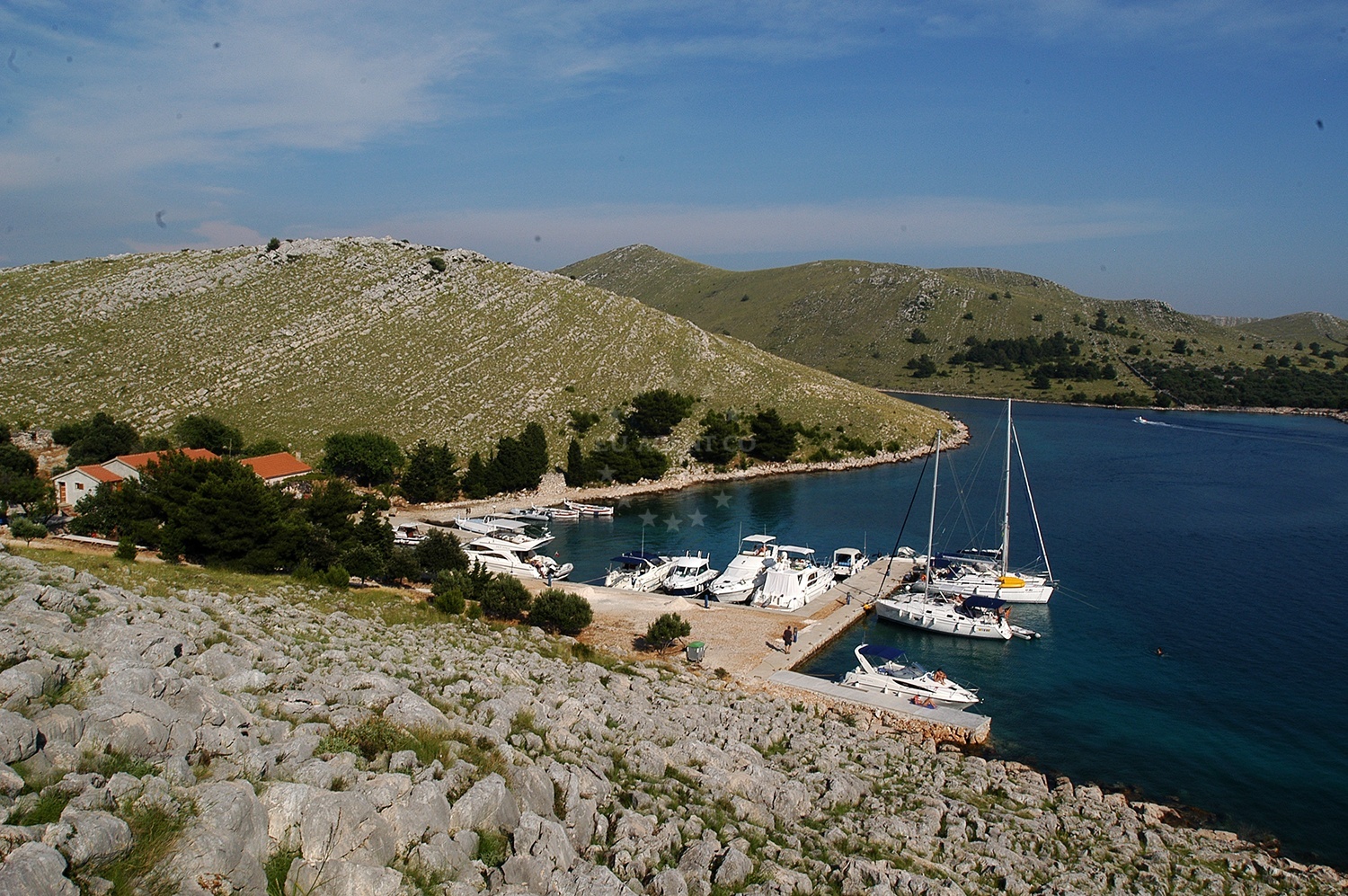 Yachts mooring at Restaurant Mare Jetty, Katina Island