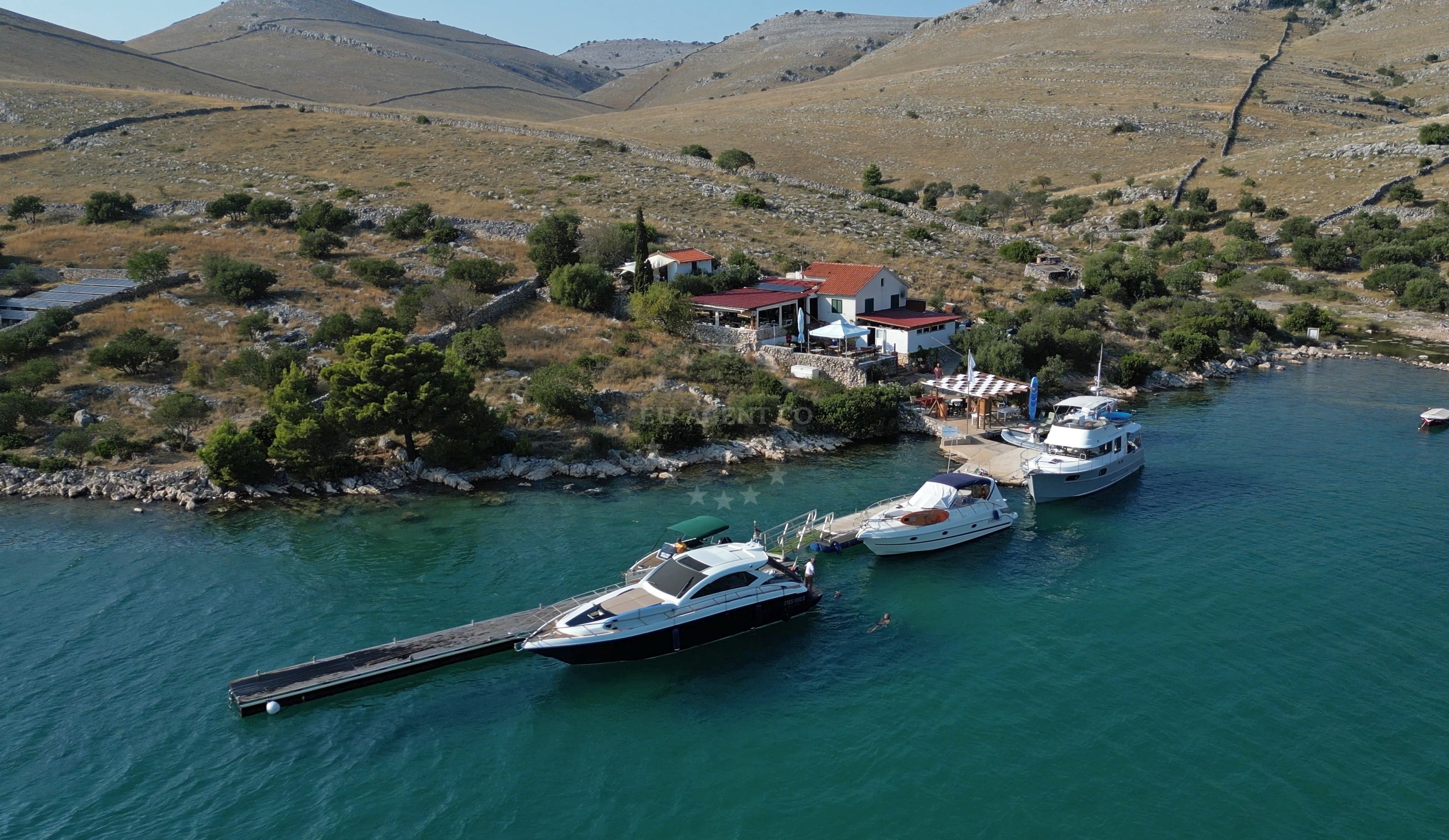 Konoba Robinson Jetty with mooring lines and Adriatic Sea view