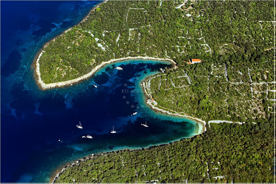 Overview of Sv. Nikola Bay with surrounding coastal landscape