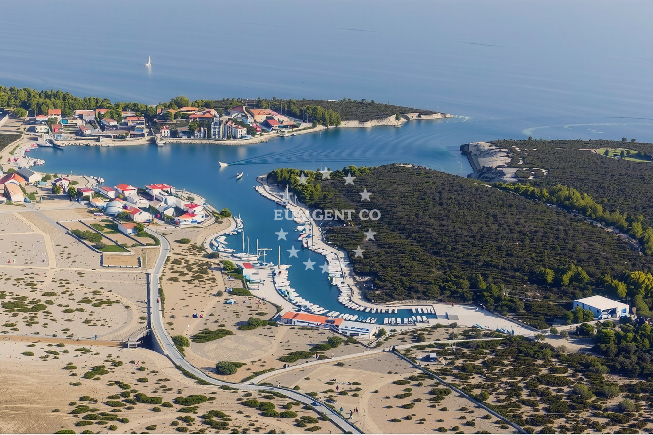 Jetty in Gromace, Pag, Croatia, with boats moored along the northern coastline
