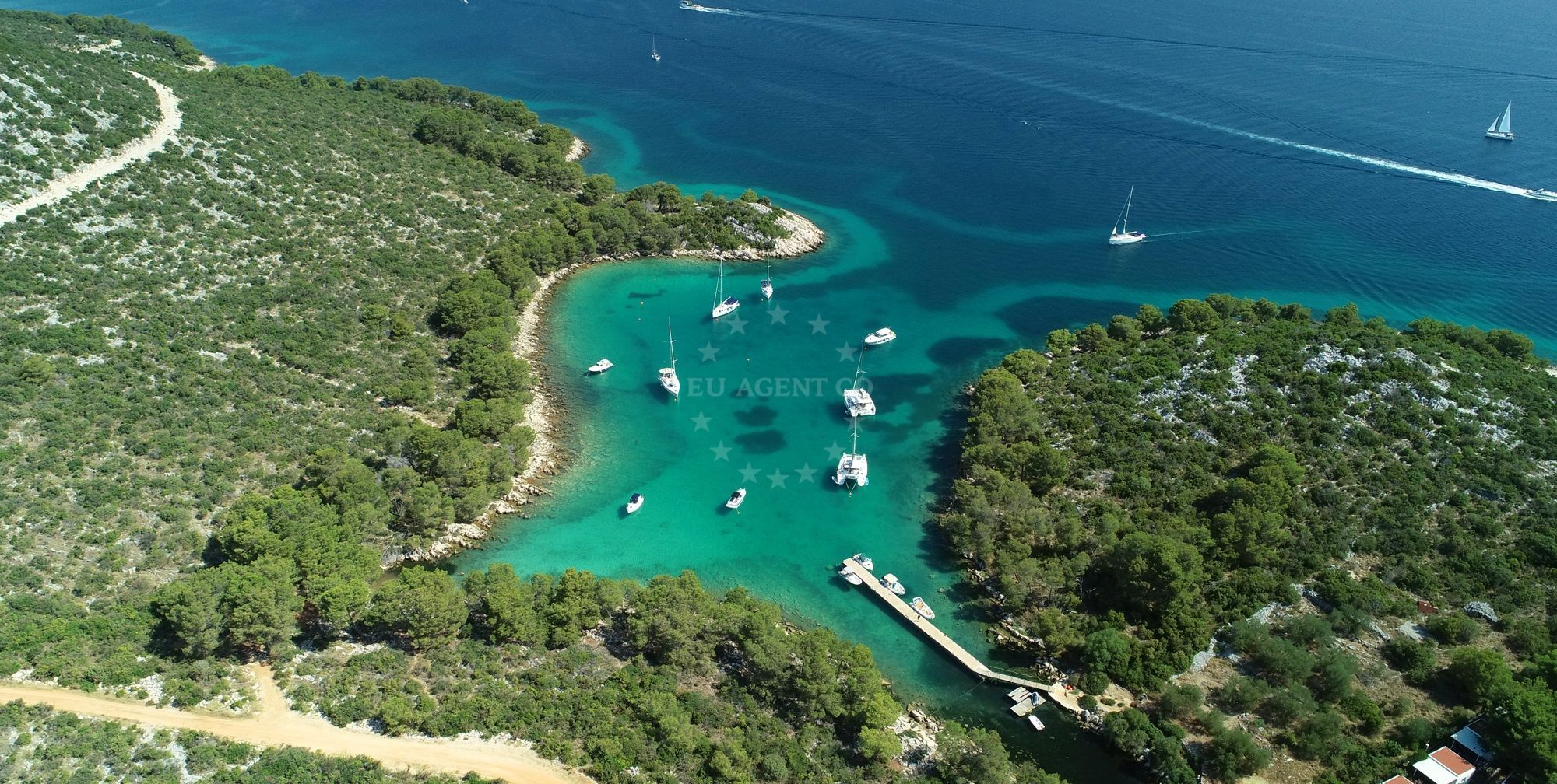 Zaklopica Buoy Field on Pasman Island, Croatia with rocky shoreline