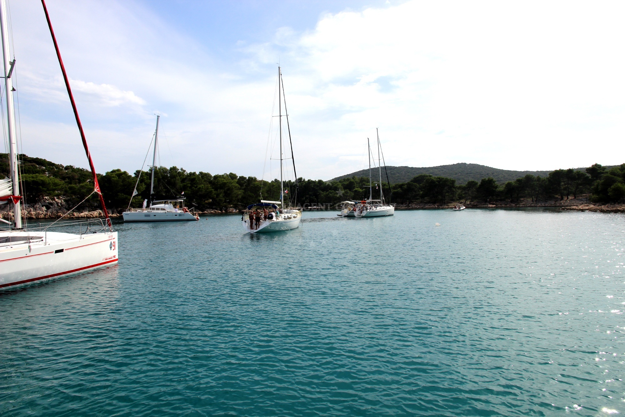 Sailboats moored at Zaklopica Buoy Field, Croatia