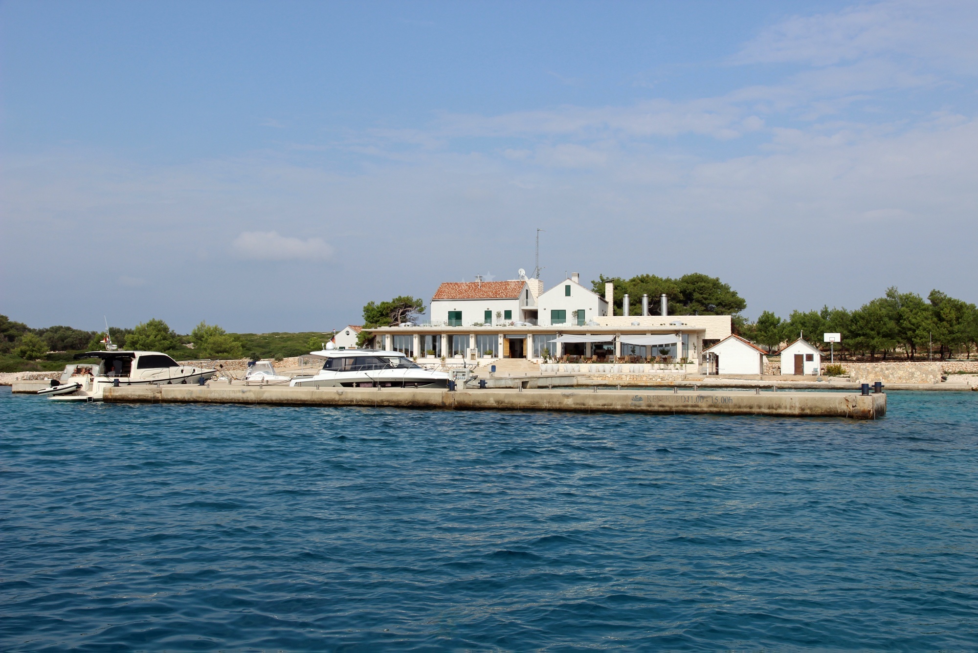 Yachts moored at Restaurant Zakan Jetty, Ravni Zakan, Croatia