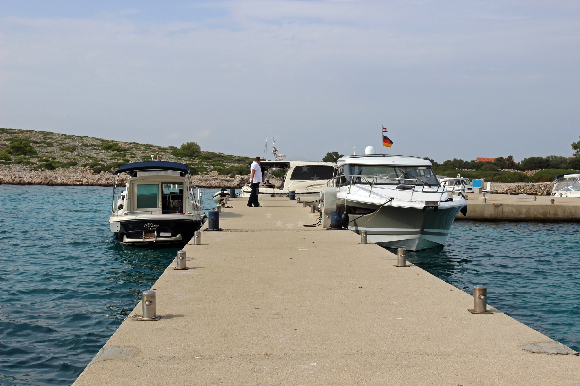 View of Restaurant Zakan Jetty and surrounding coastal landscape