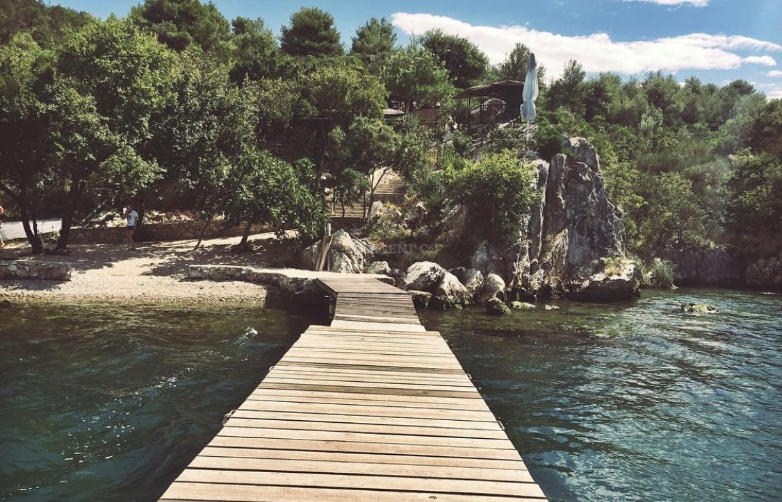 Konoba Smokvić Jetty overlooking Krka River, Skradin, Croatia