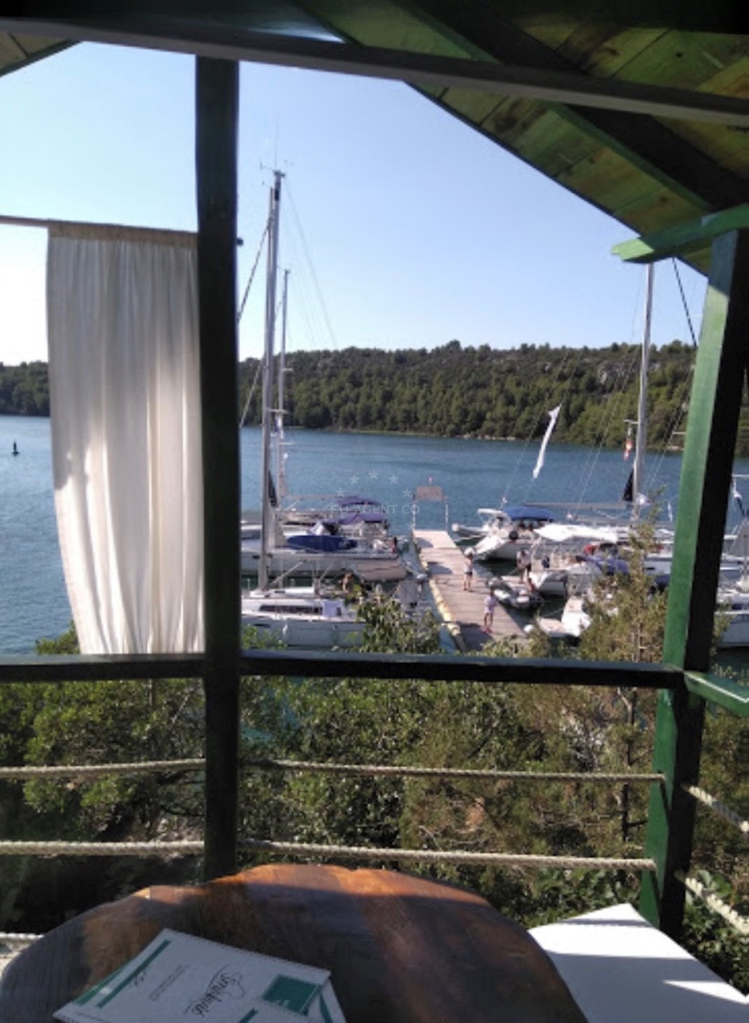 View of Skradin Bridge from Konoba Smokvić Jetty