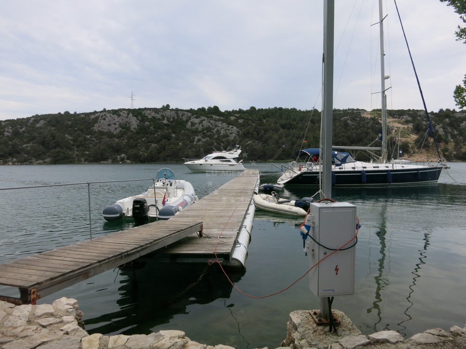 Boat moored at Konoba Vidrovaca jetty, Skradin