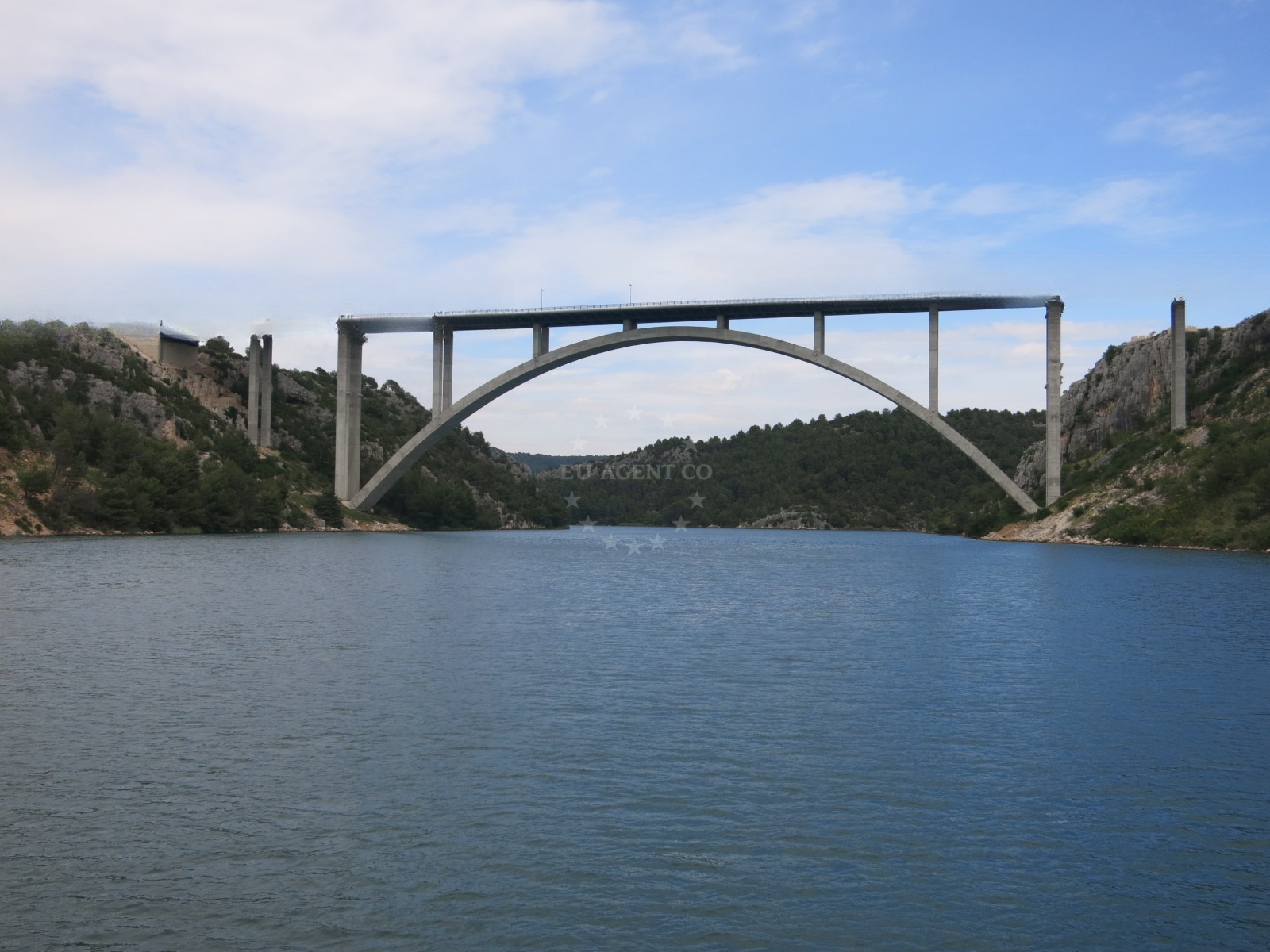 Skradin coastline with Konoba Vidrovaca jetty in the distance