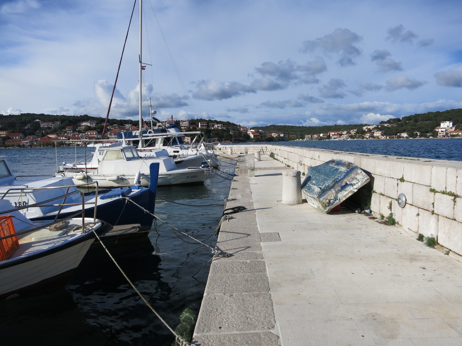 View of the bridge connecting Tisno to the mainland with speed limit signage