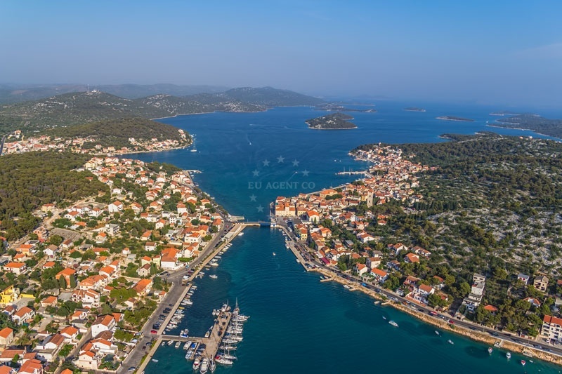 Quay in Tisno, North Dalmatia, Croatia with boats mooring near Murter Island
