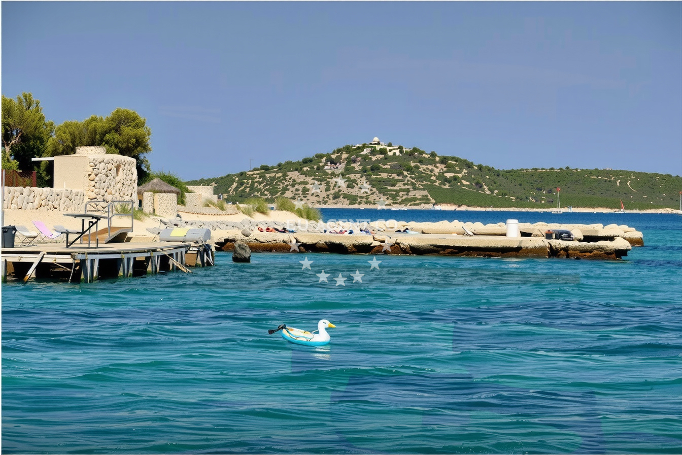 Mooring lines at Zizanj Jetty, North Dalmatia, Croatia with shallow water visible