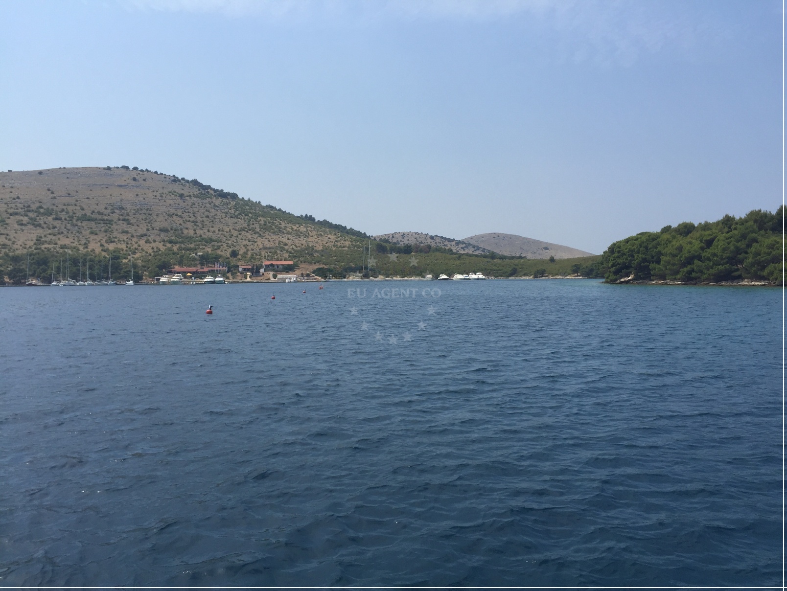 ACI Zut Buoy Field with mooring lines and view of Zut Island