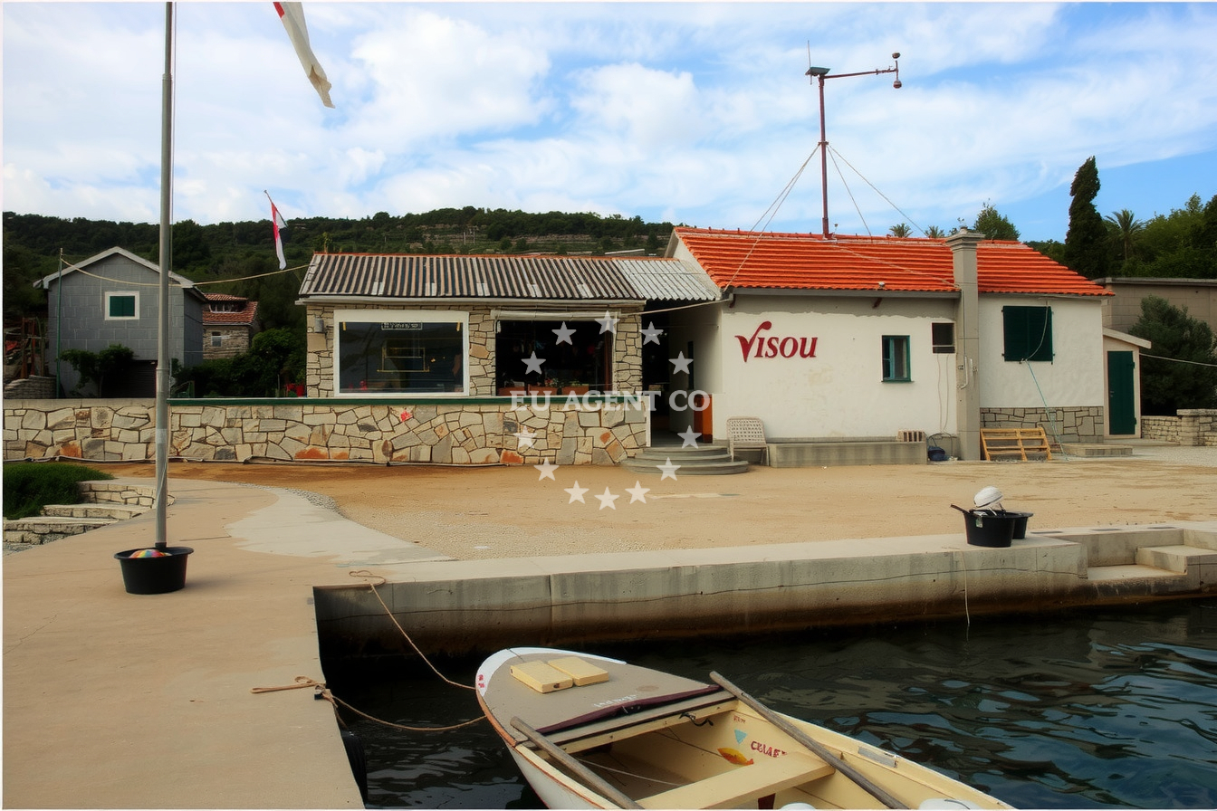 Jetty at Konoba Vison, Dragisina, Zut, North Dalmatia, Croatia, with restaurant in the background