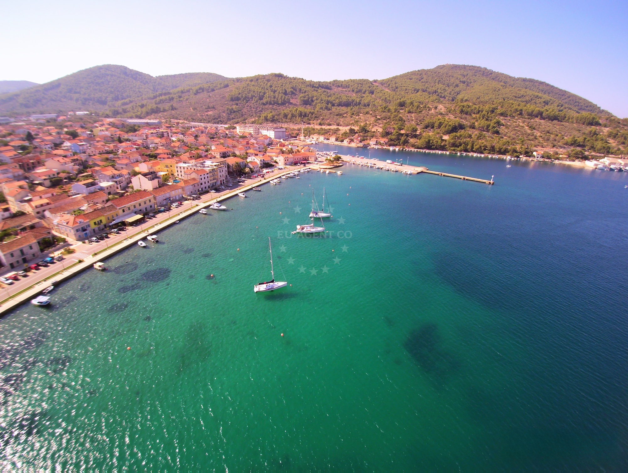 Adriatic coastline near Vela Luka buoy field with mooring buoys