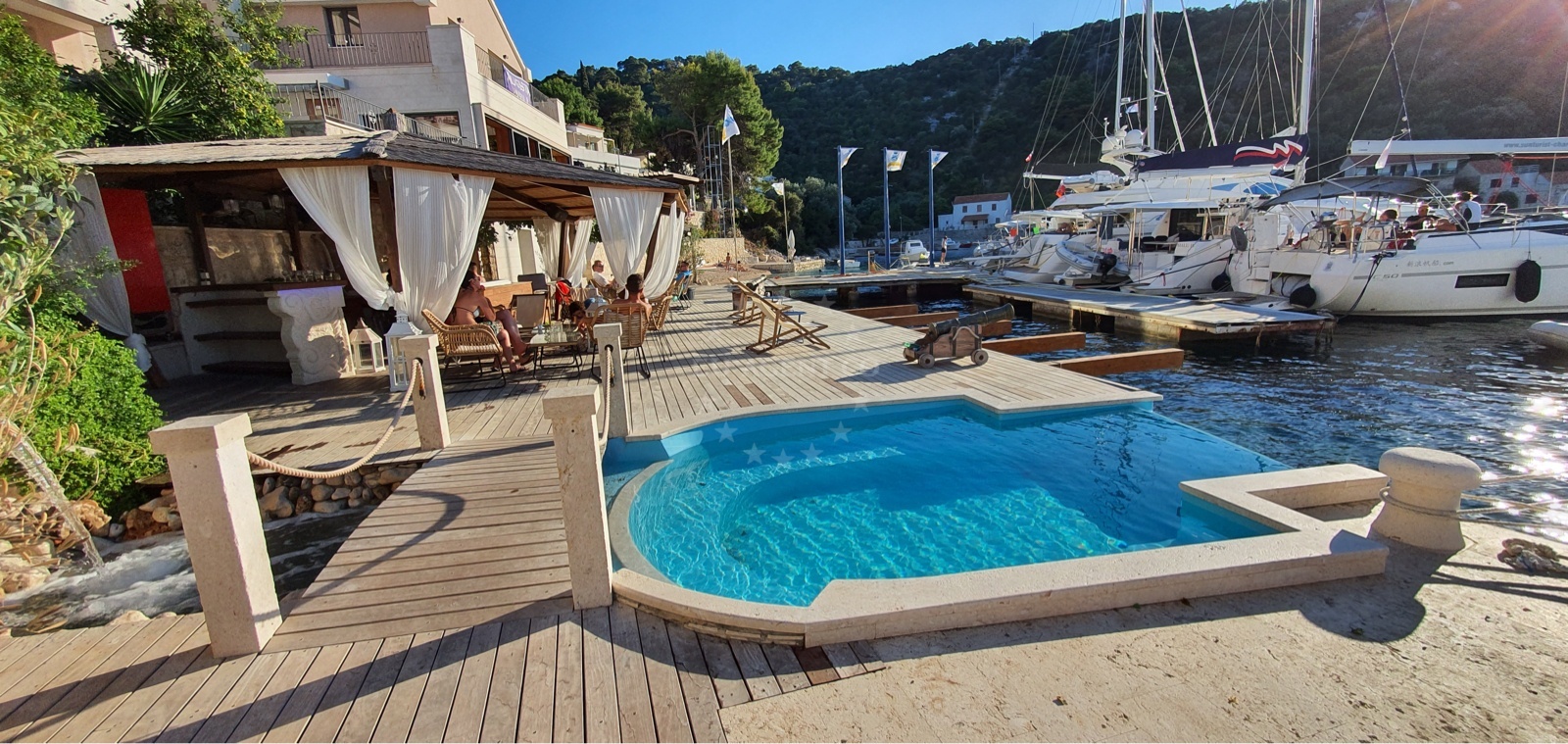 Augusta Insula jetty with moored yachts in Zaklopatica Bay, Lastovo Island