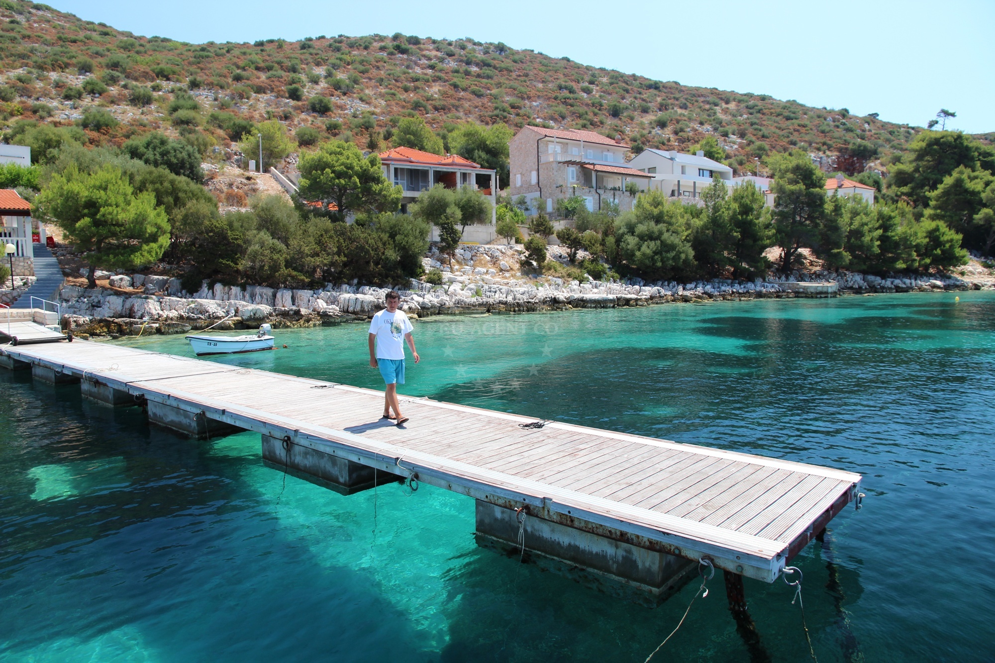 Lastovo Jetty with mooring lines and views of the island