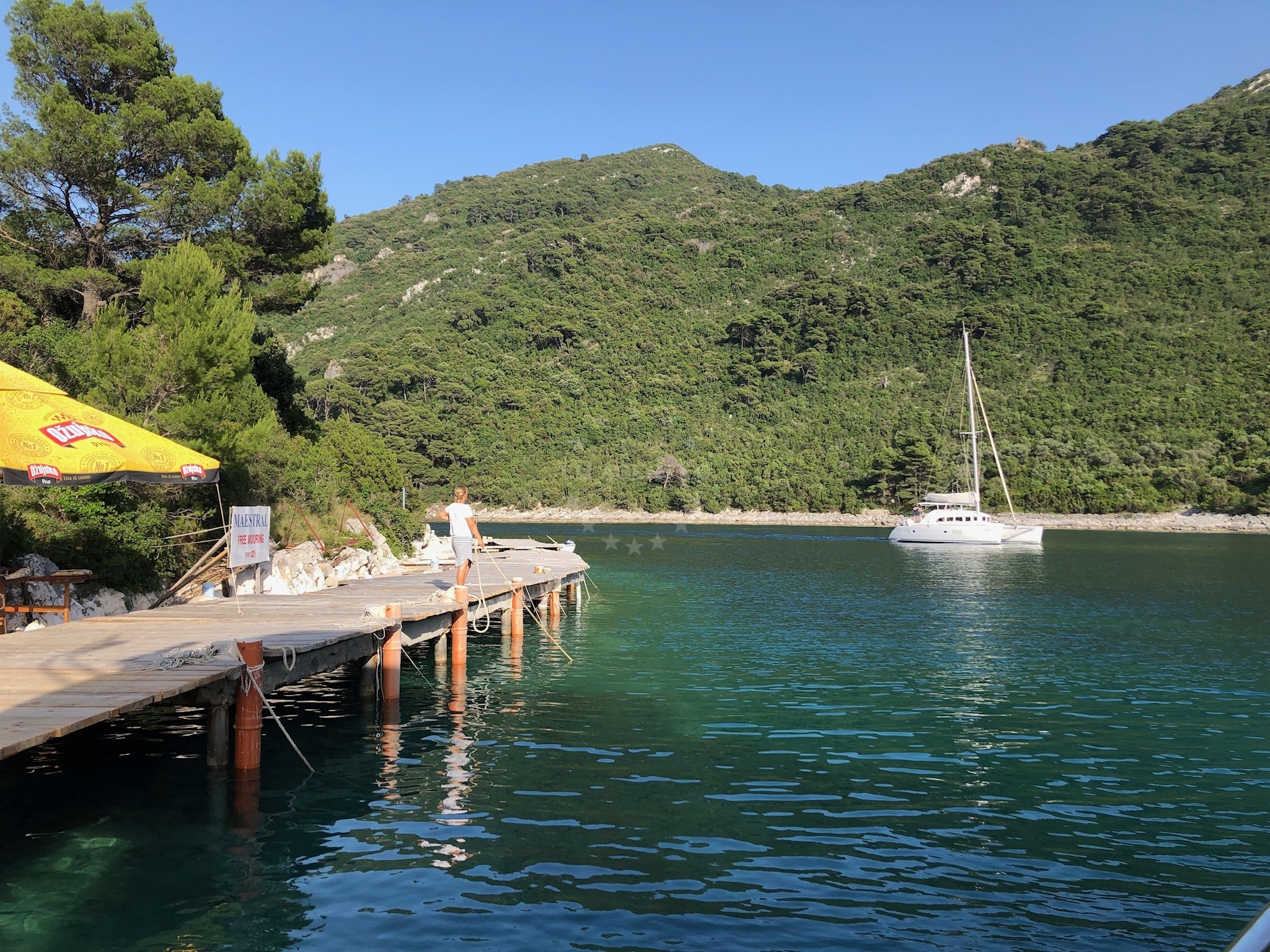 View of Restaurant Maestral Quay and surrounding waters in Okuklje, Mljet