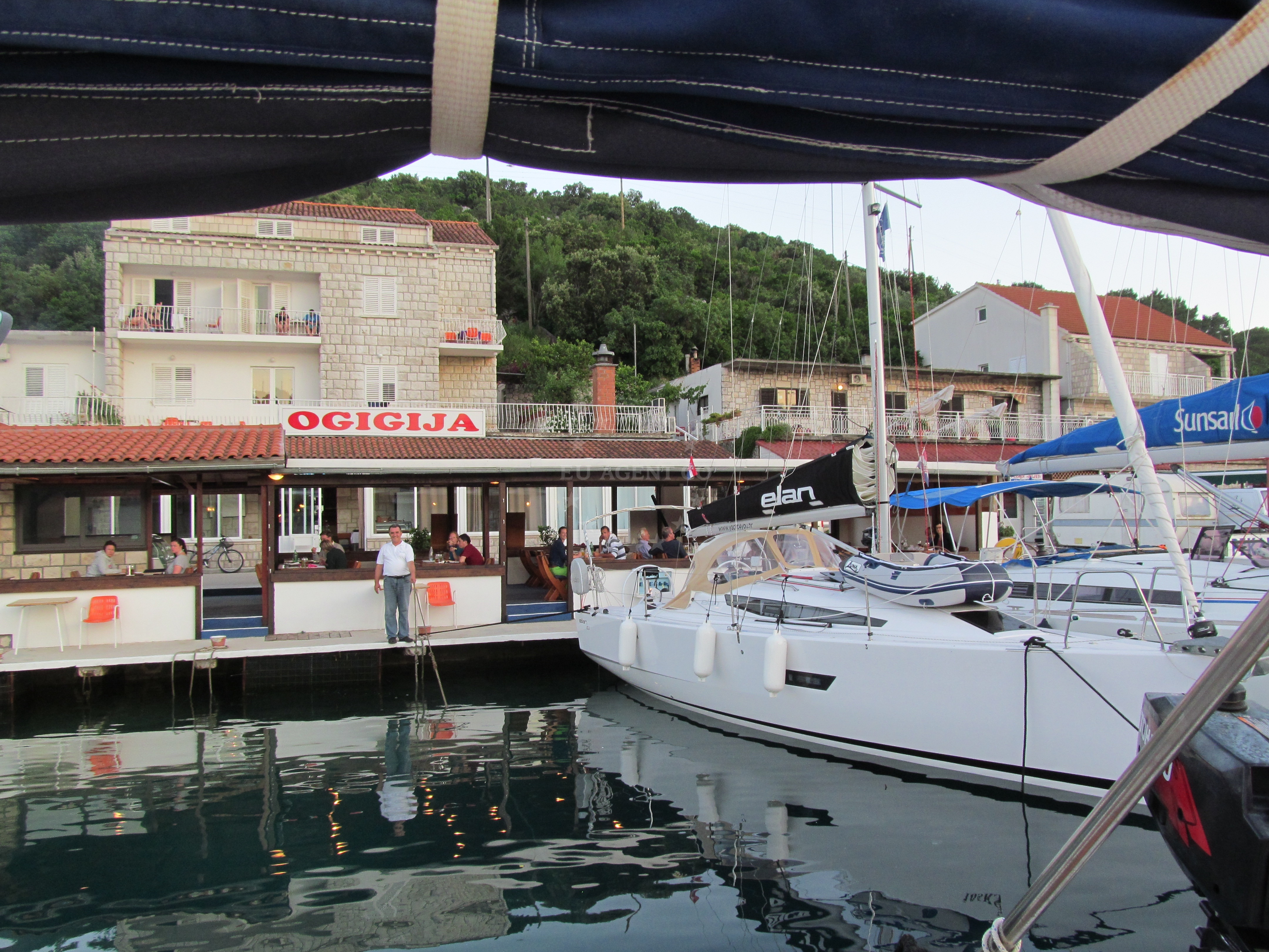 Konoba Ogigija Quay in Polace, Mljet with yachts moored at buoy berths