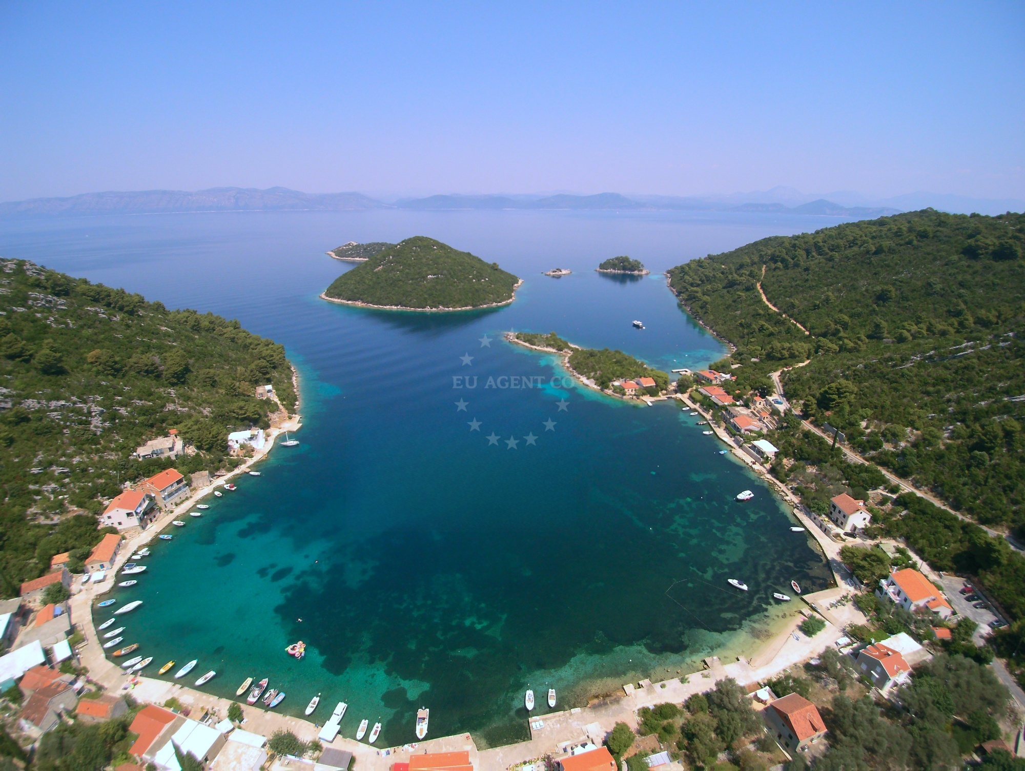 View of Konoba Barba Quay and surrounding Prozura coastline